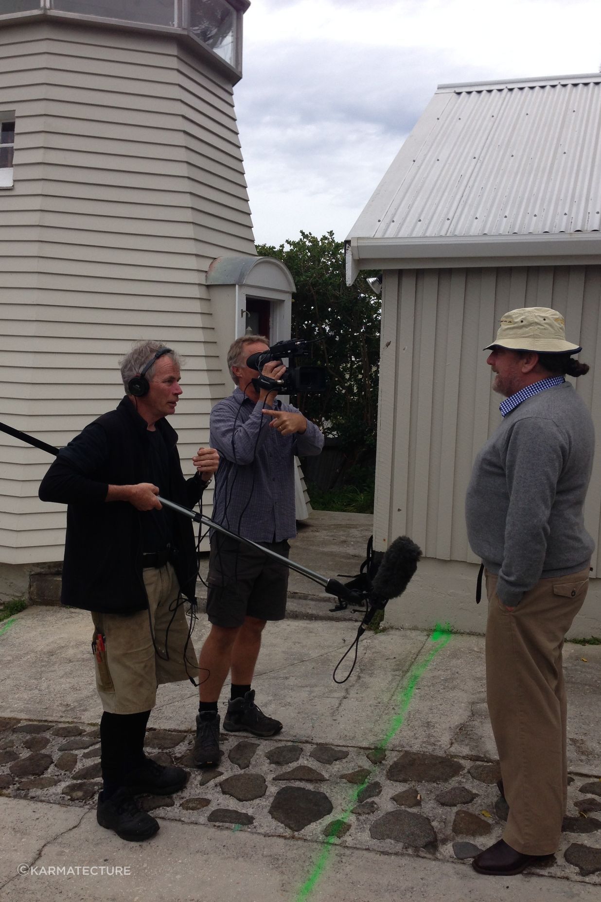 The owner, on the right, with some of the film crew from Gran Designs Australia
