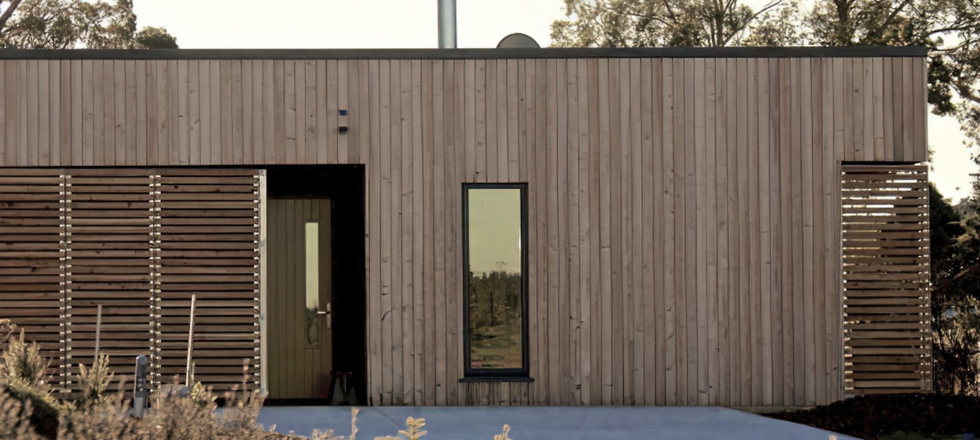 Kowhai Cabin Keeps Warm in Winter, Cool in Summer banner
