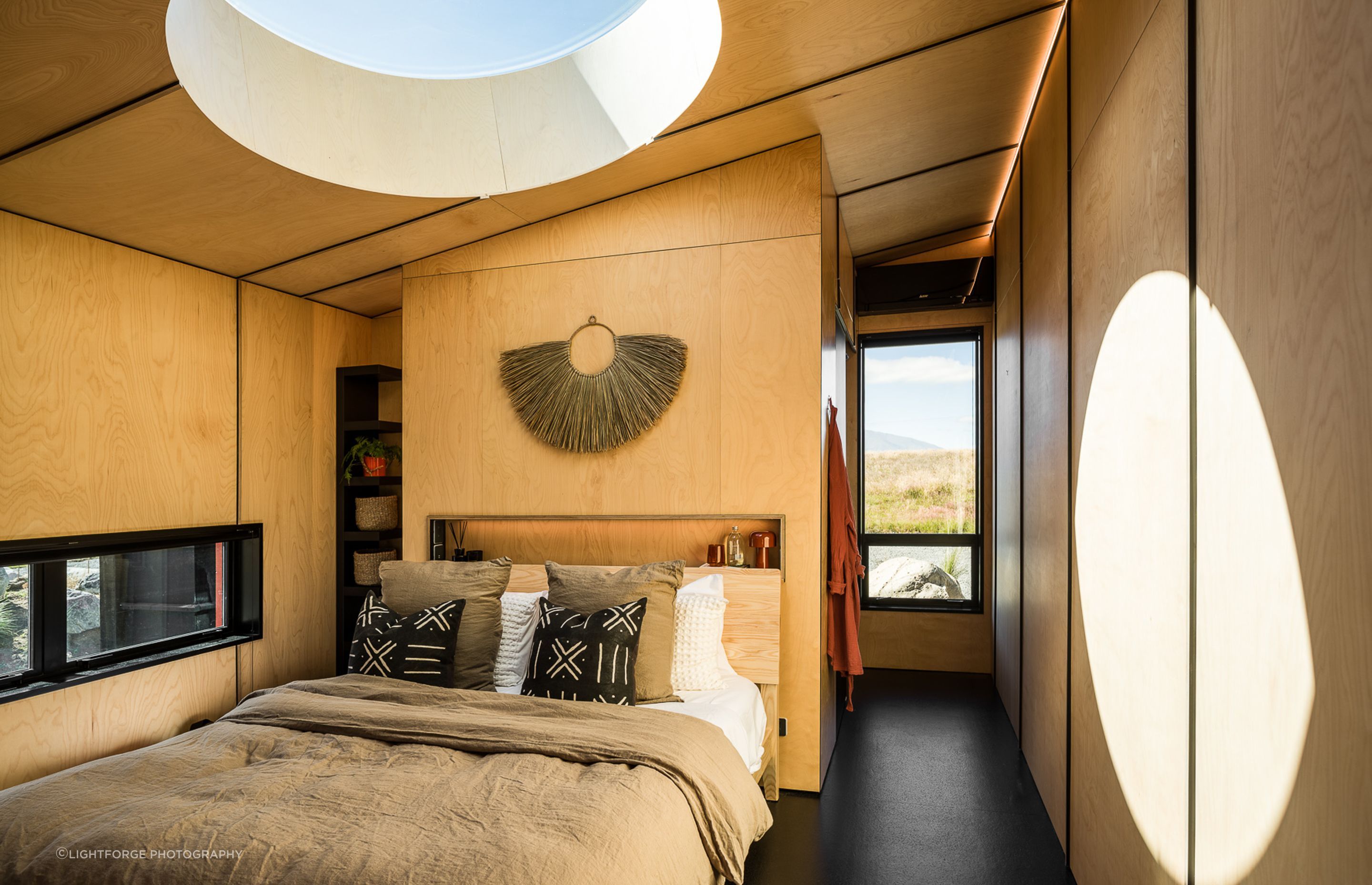 The black-edged ply rib detailing represents the “cradle” of being inside—protected, safe and private.