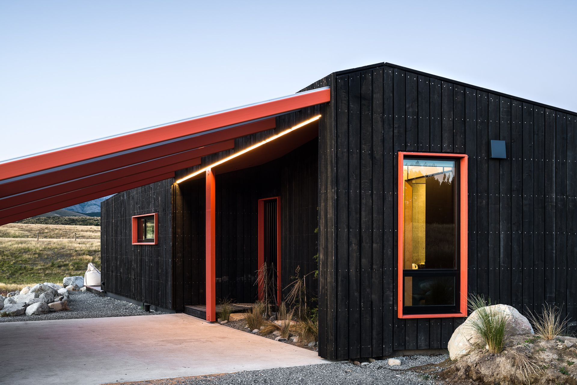 The rain screen cladding was chosen as it will weather in overtime and can also be removed and replaced as necessary. The use of LED 'light beams'—both externally and internally—helps accentuate the folds and creases within the architecture.