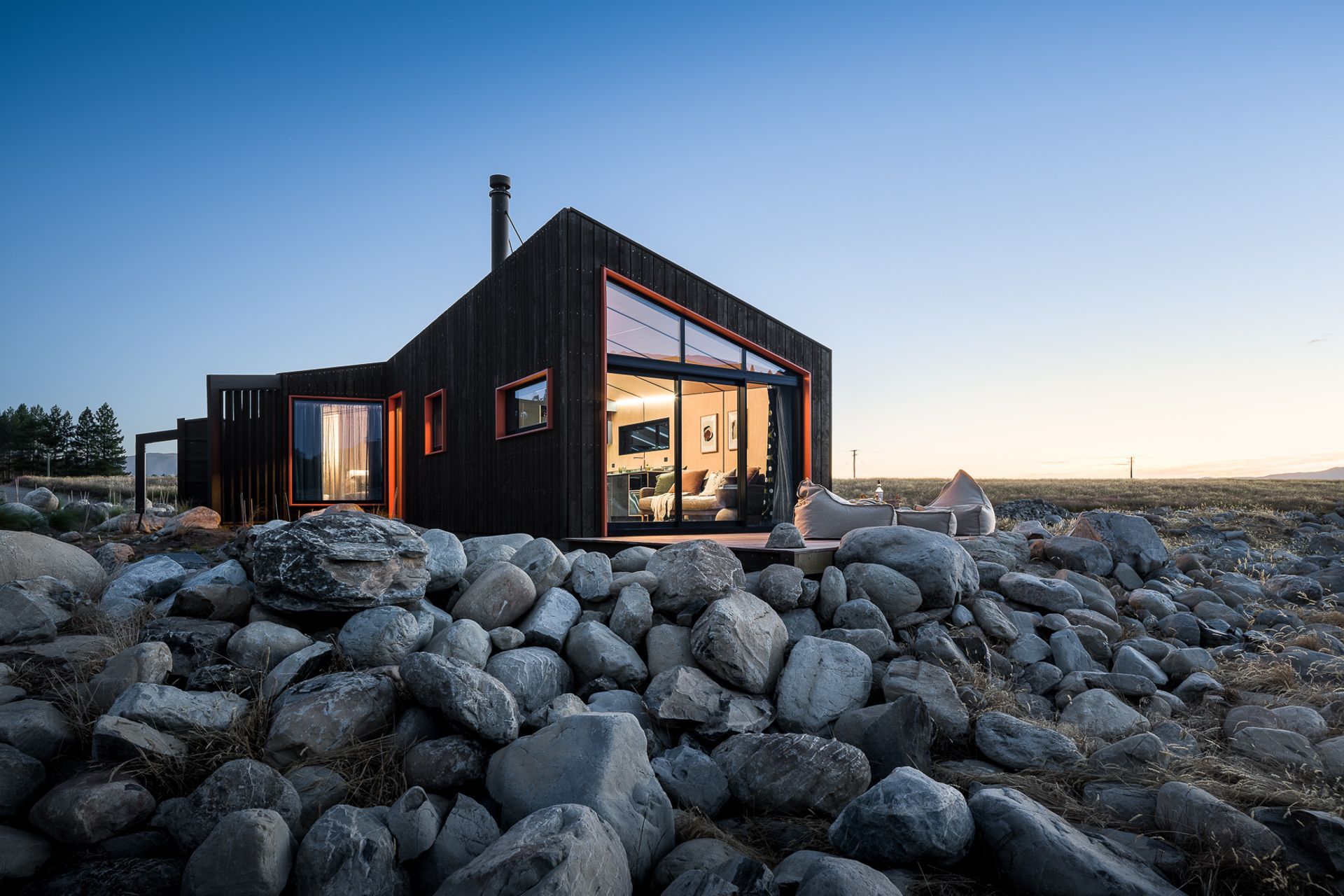 The shape and form of the cabin, along with the placement of the windows, was derived from plotting specific views from certain activities: lying in bed; washing the dishes; having a shower; and sitting or standing in the living area.