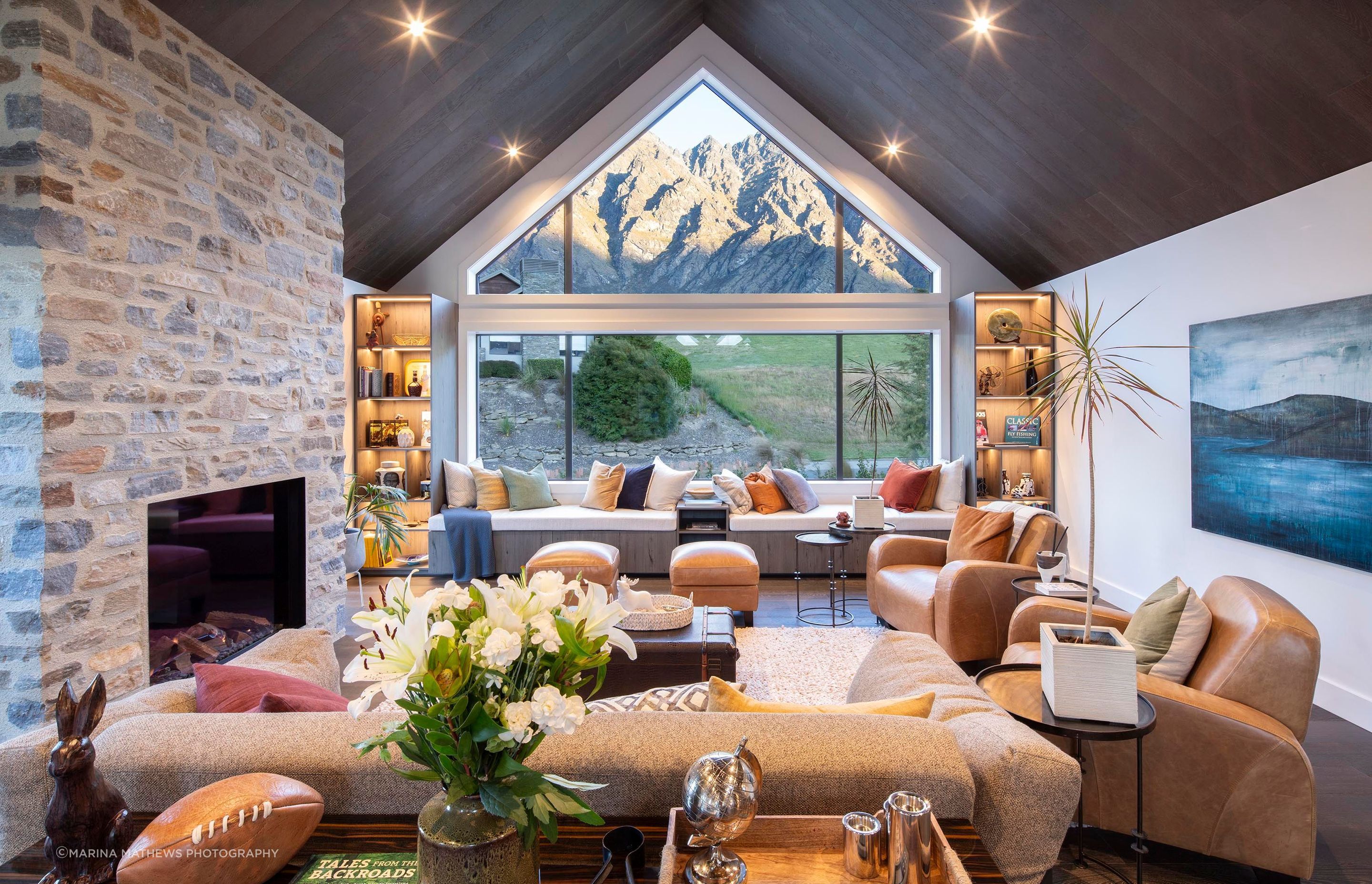 Modern-rustic-living-room-with-feature-schist-fireplace.jpg