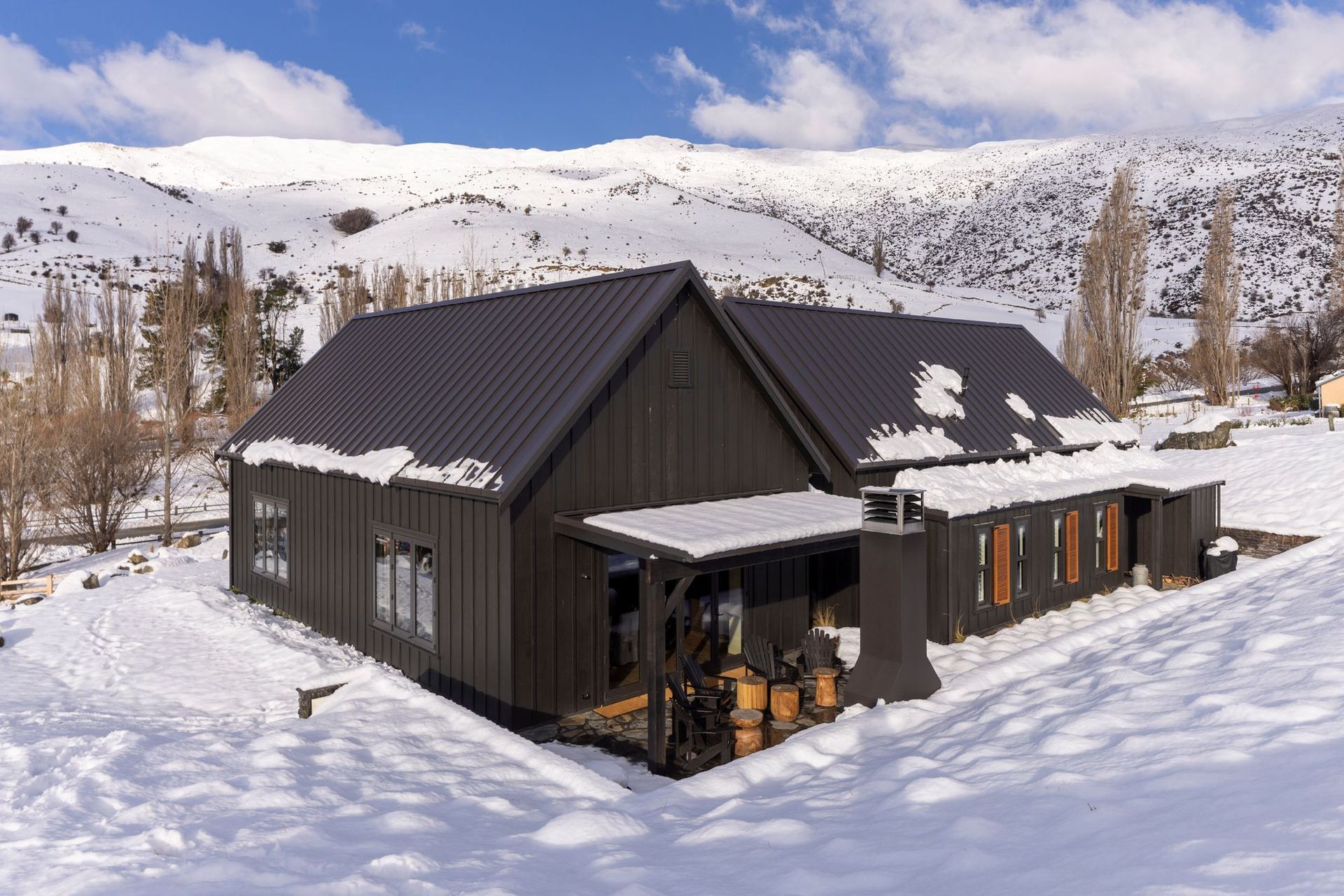The back of the house. Both barn forms are identical in size and shape.
