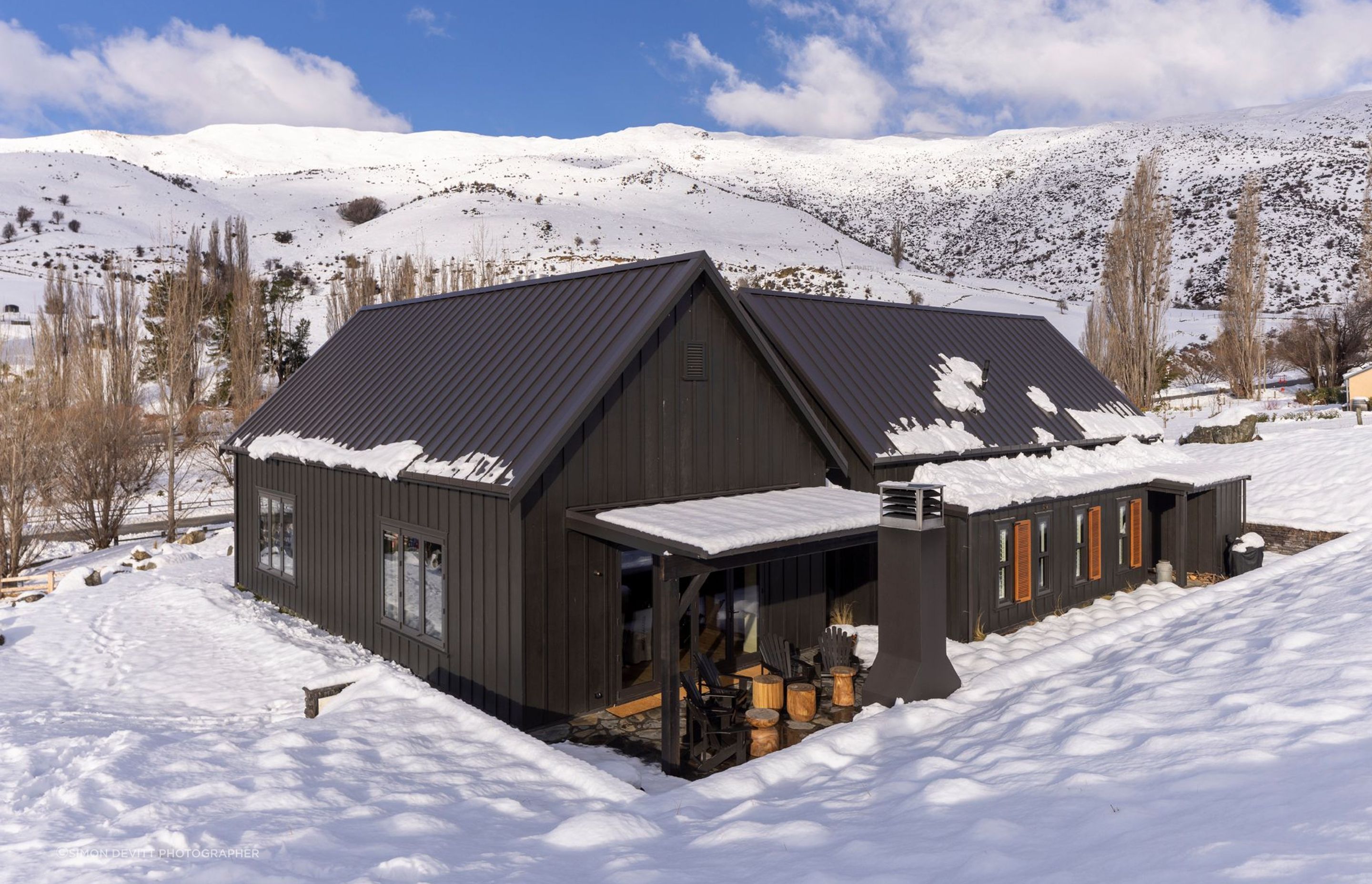 The back of the house. Both barn forms are identical in size and shape.