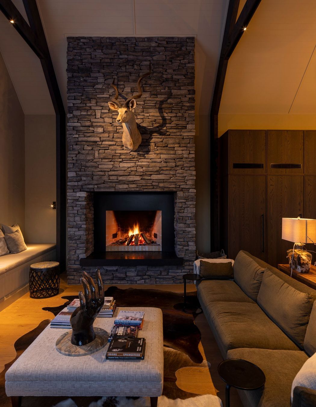 The lounge area. “All of the fabrics have a lot of texture and a very restrained palette in terms of olives and taupes,” says Vee.