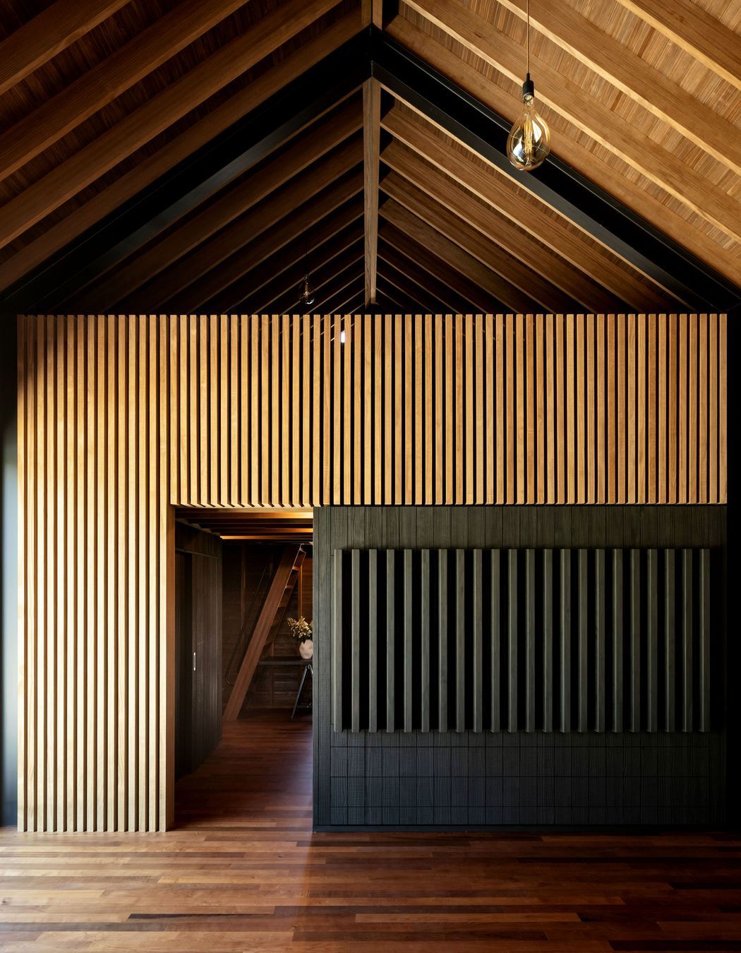 Custom joinery features samples of the Abodo products, which can be pulled out on drawers.