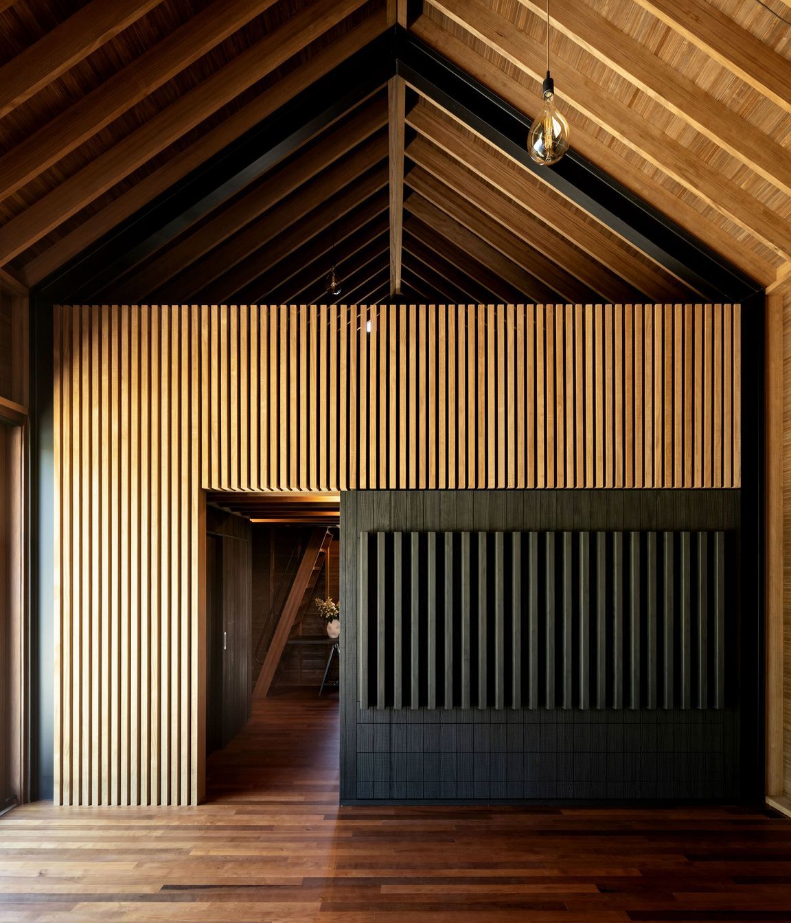 Custom joinery features samples of the Abodo products, which can be pulled out on drawers.