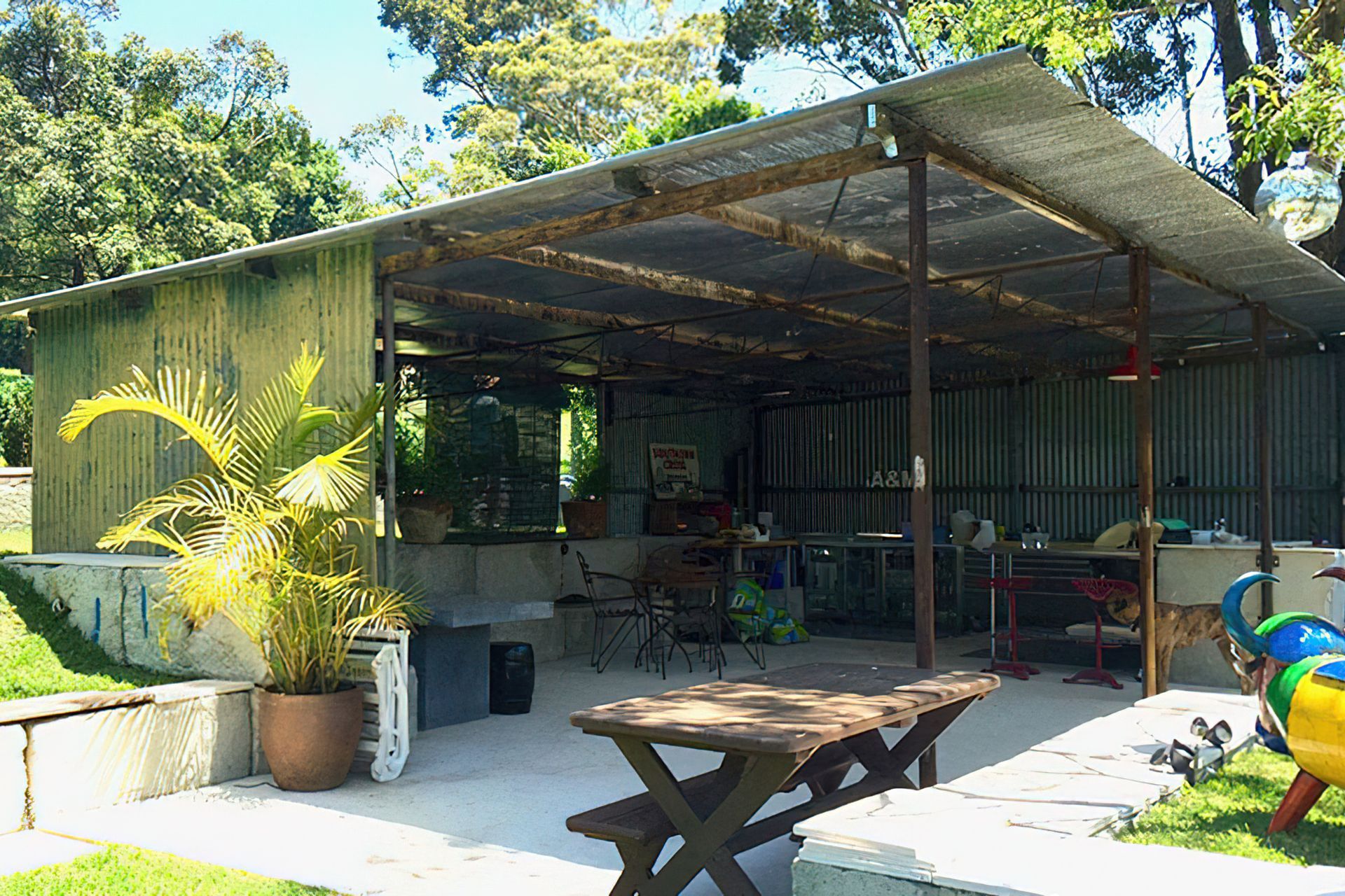 Reuse of an existing farm shed was relocated onto a based of concrete waste blocks