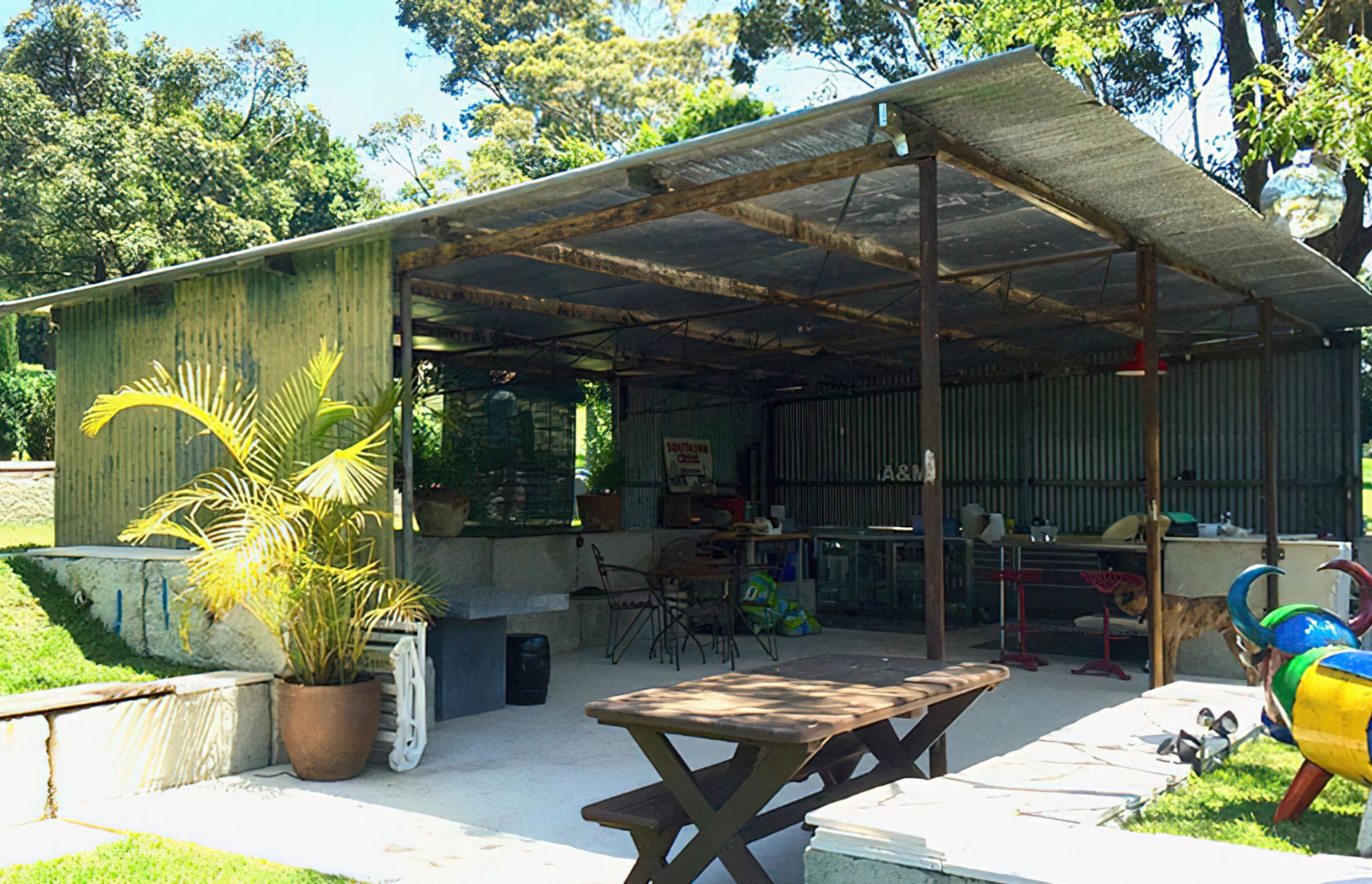 Reuse of an existing farm shed was relocated onto a based of concrete waste blocks