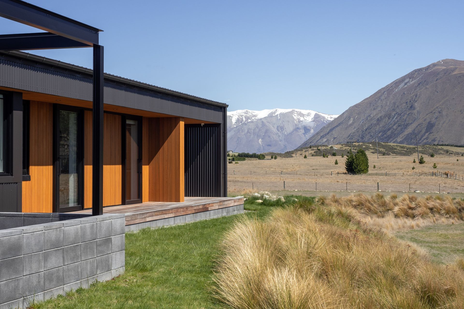 Beth says the cedar cladding is only in areas within easy reach. “They can access it and re-stain it without requiring scaffolds and ladders.”