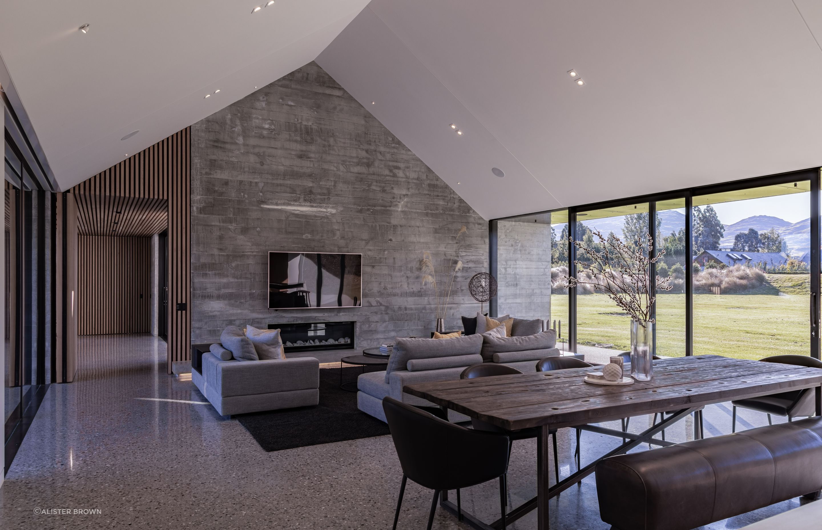 A gabled ceiling in the main living space adds to the home's grandeur.