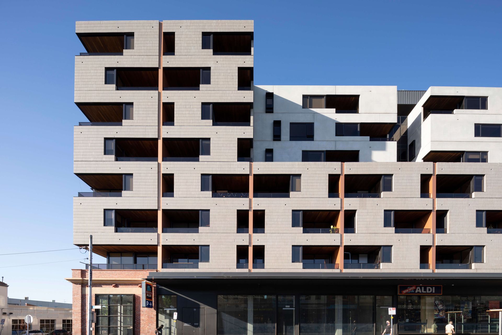 The play of shadow, texture and depth provide visual interest to the streetscape