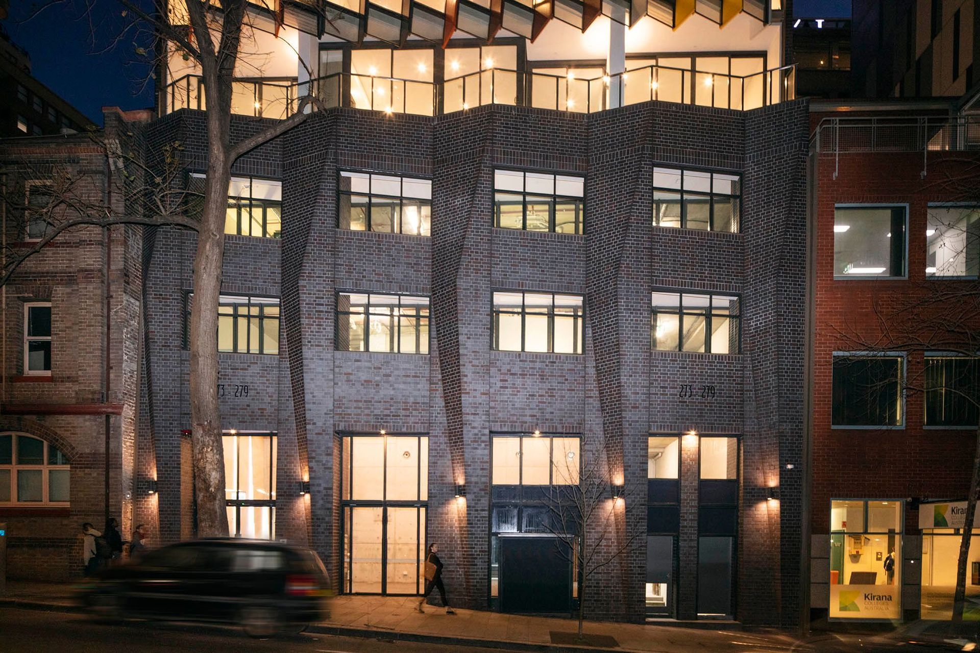 Kaz Tower's Iron Mountain brick podium is beautiful at night