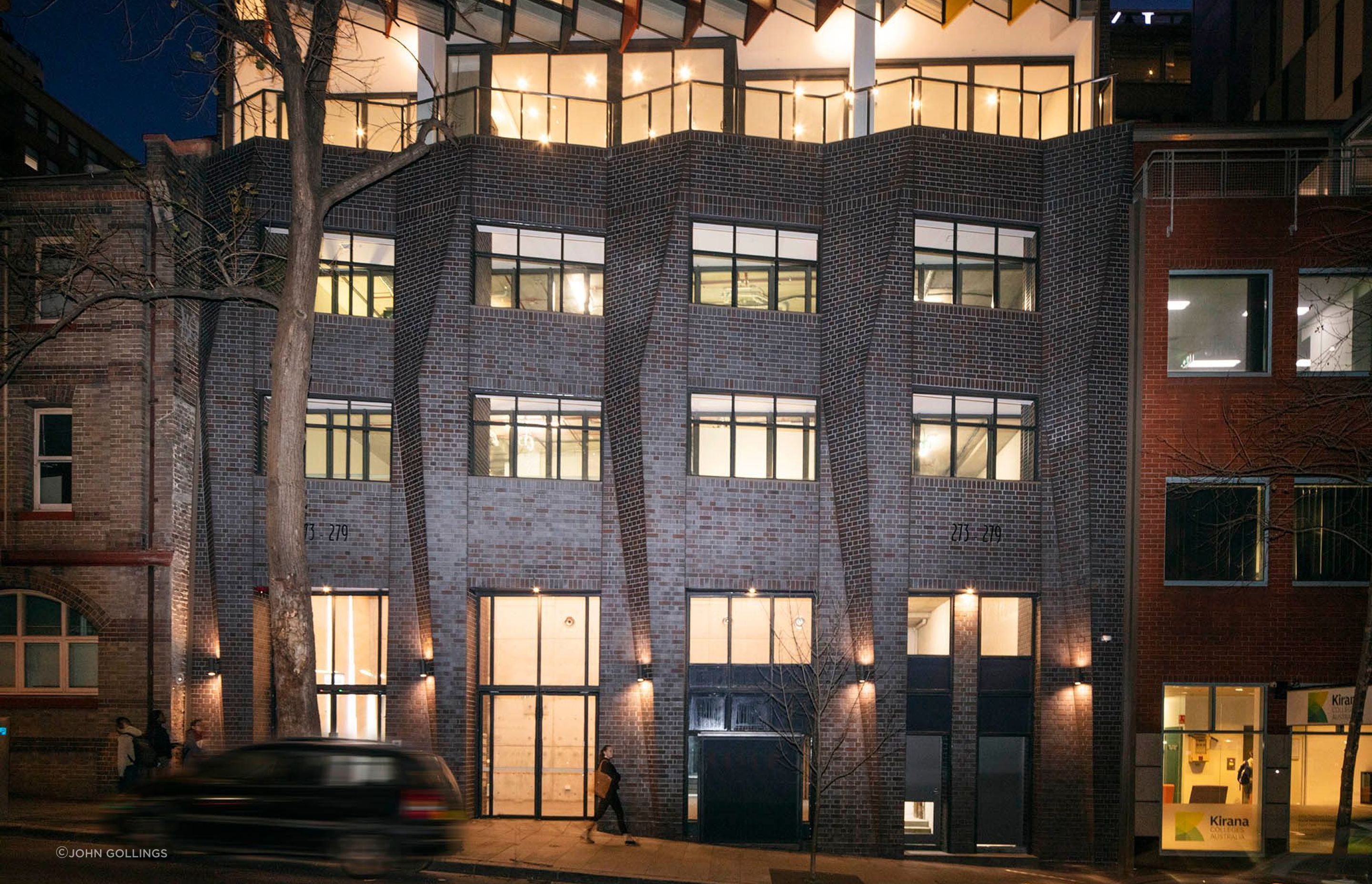 Kaz Tower's Iron Mountain brick podium is beautiful at night