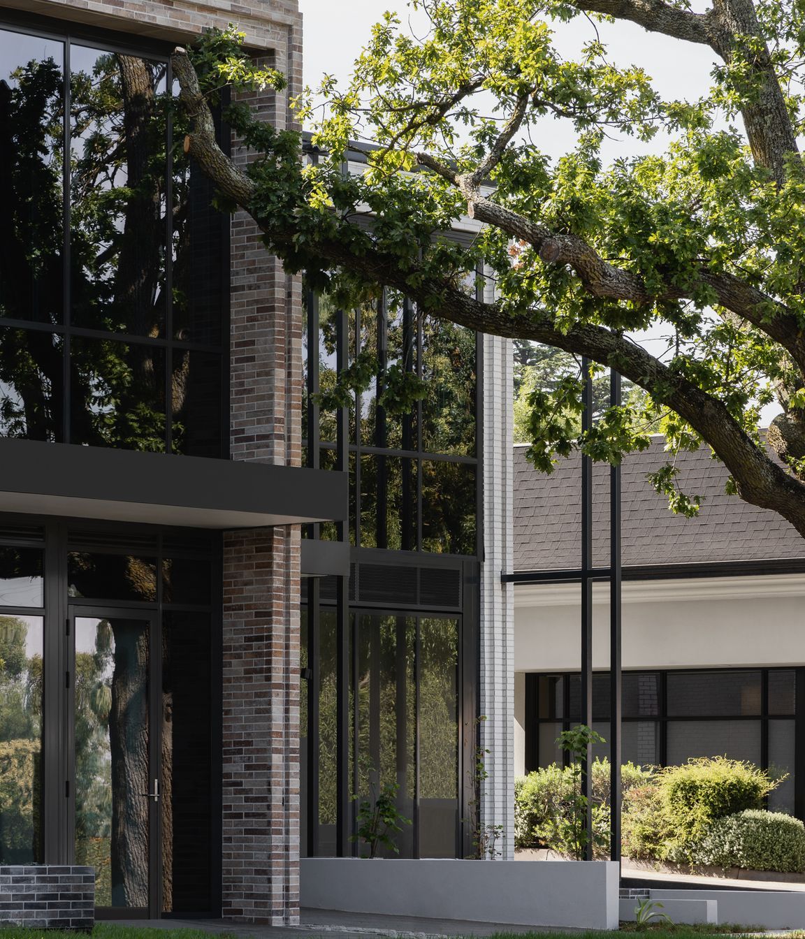 Contrasting coloured brick defines the commercial &amp; residential sides of the building