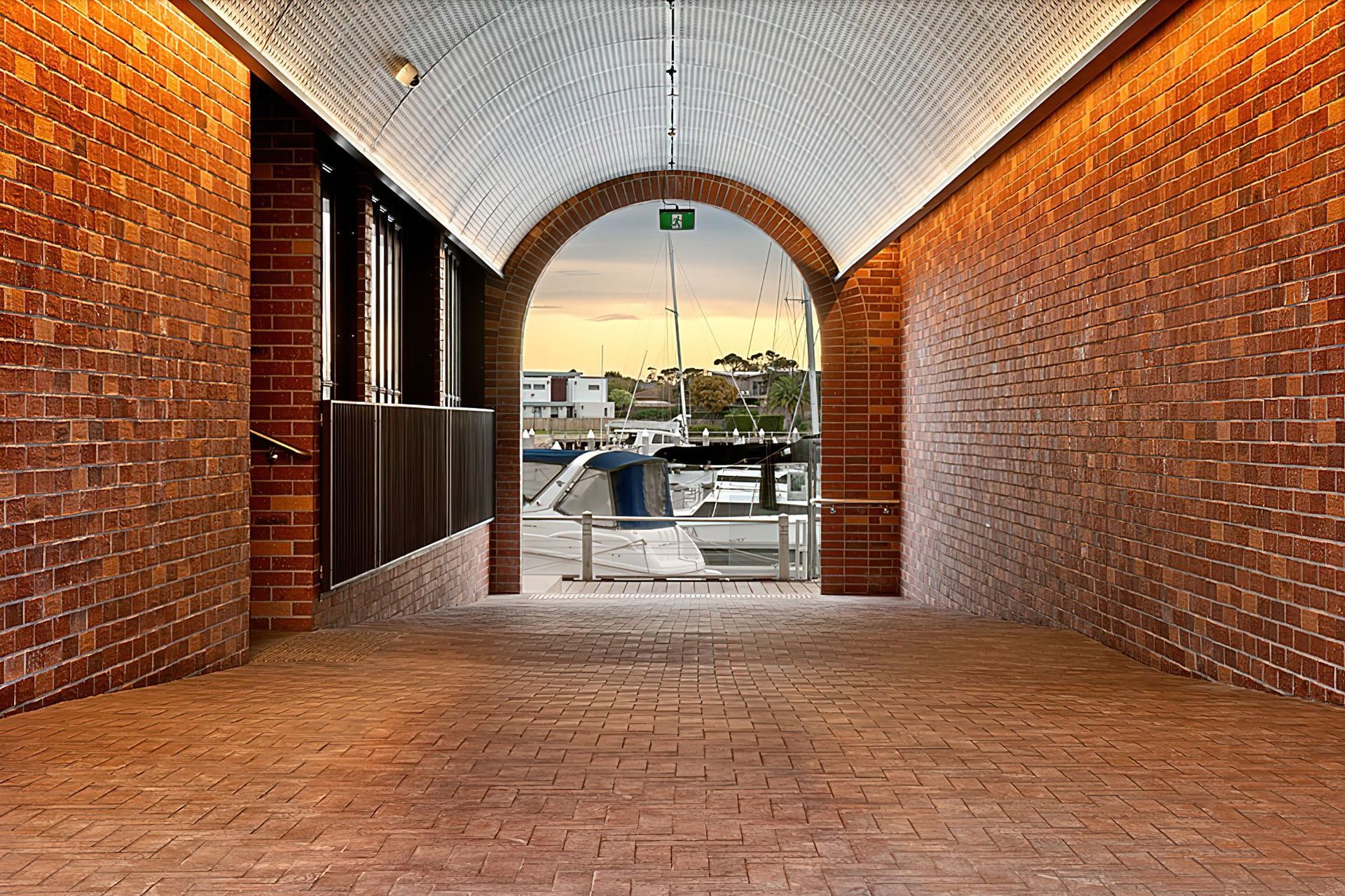 Custom Rustic brick tile blend adds variation and texture to the facade