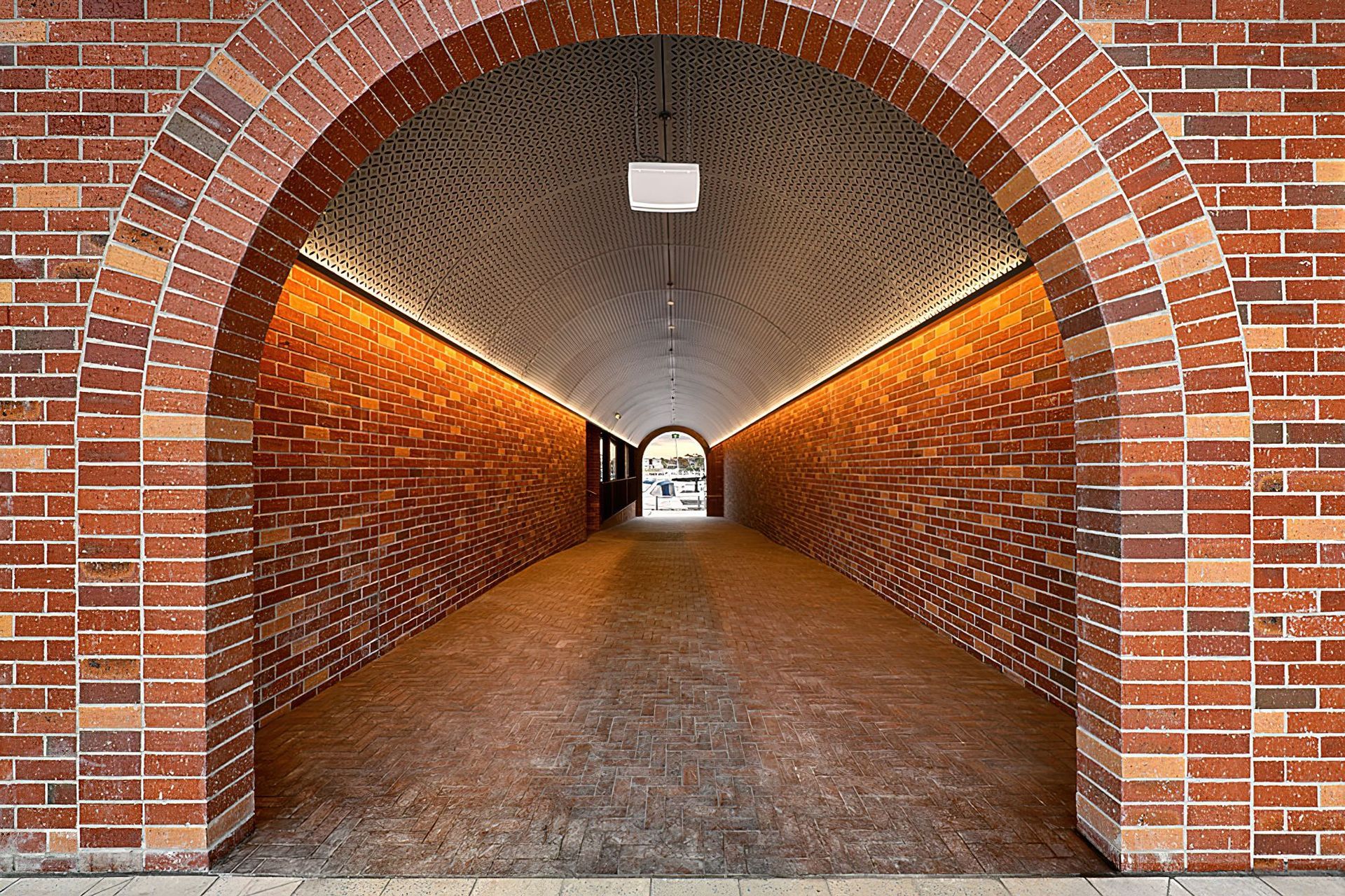 Brick inlay facade, featuring a custom Rustic brick tile blend