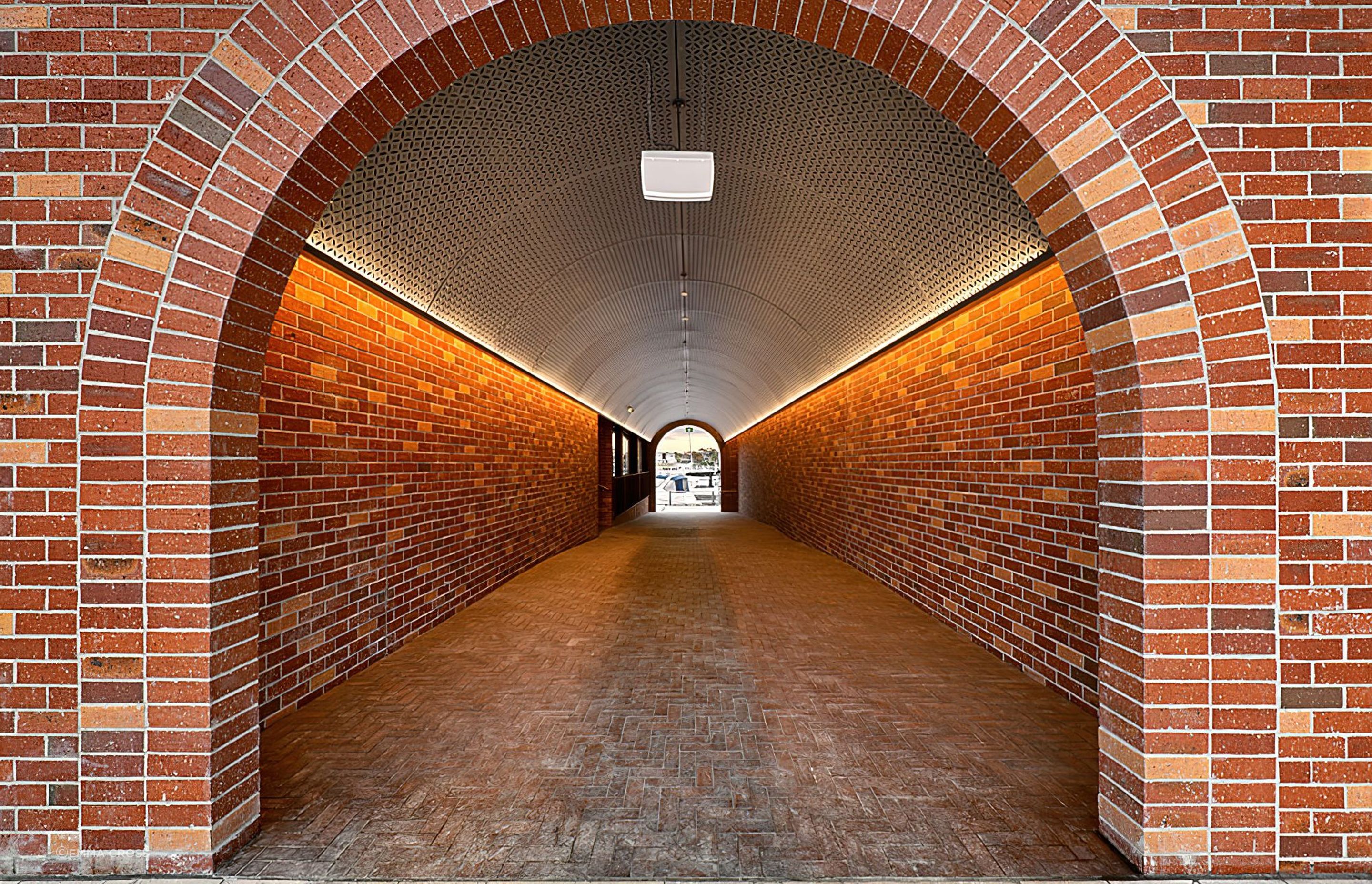 Brick inlay facade, featuring a custom Rustic brick tile blend