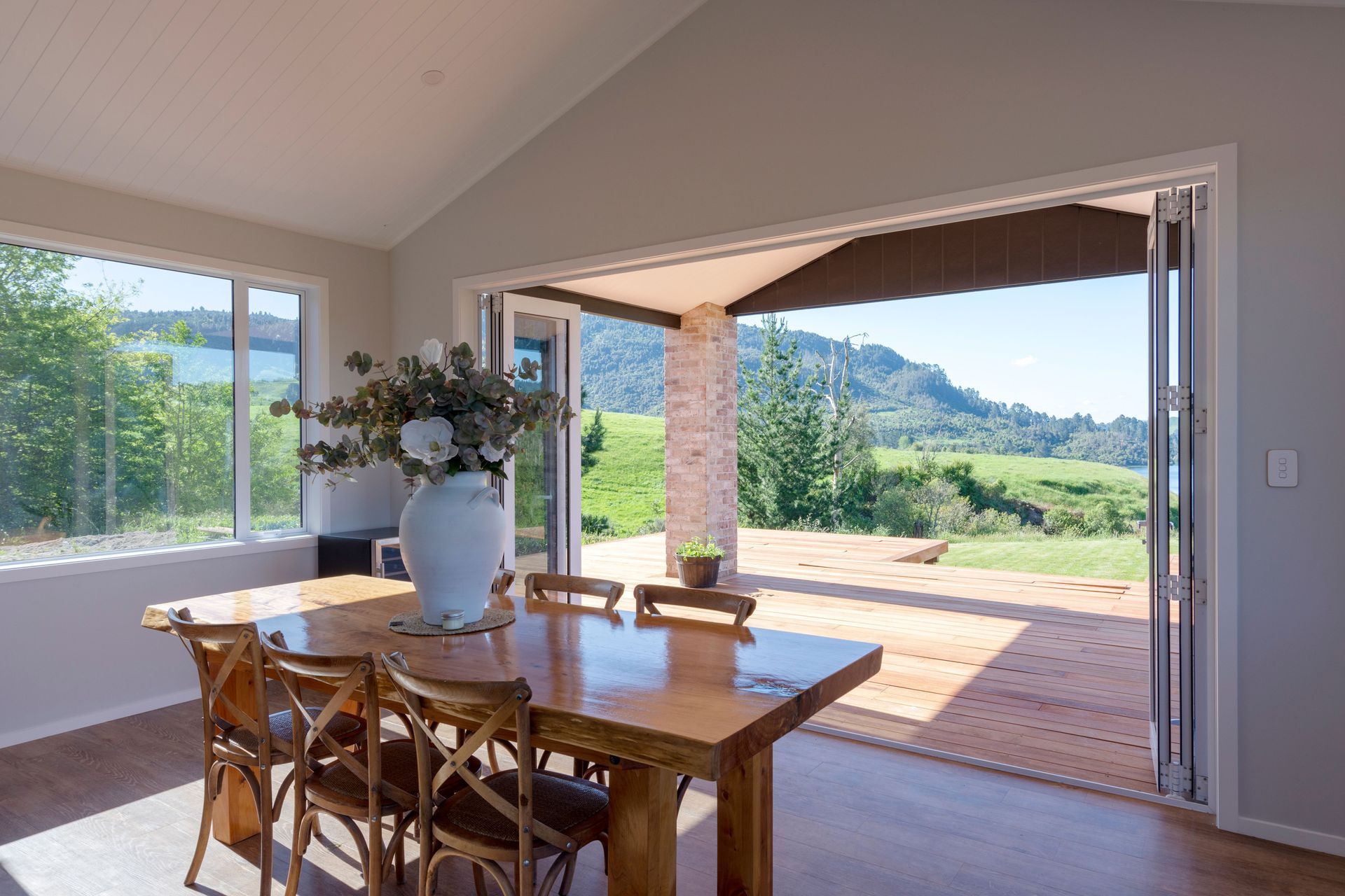 Flooring is American Oak laminate with an aged patina which fitted with the homeowners' budget and the rustic style plus, with the addition of underfloor heating, keeps the spaces nice and toasty.