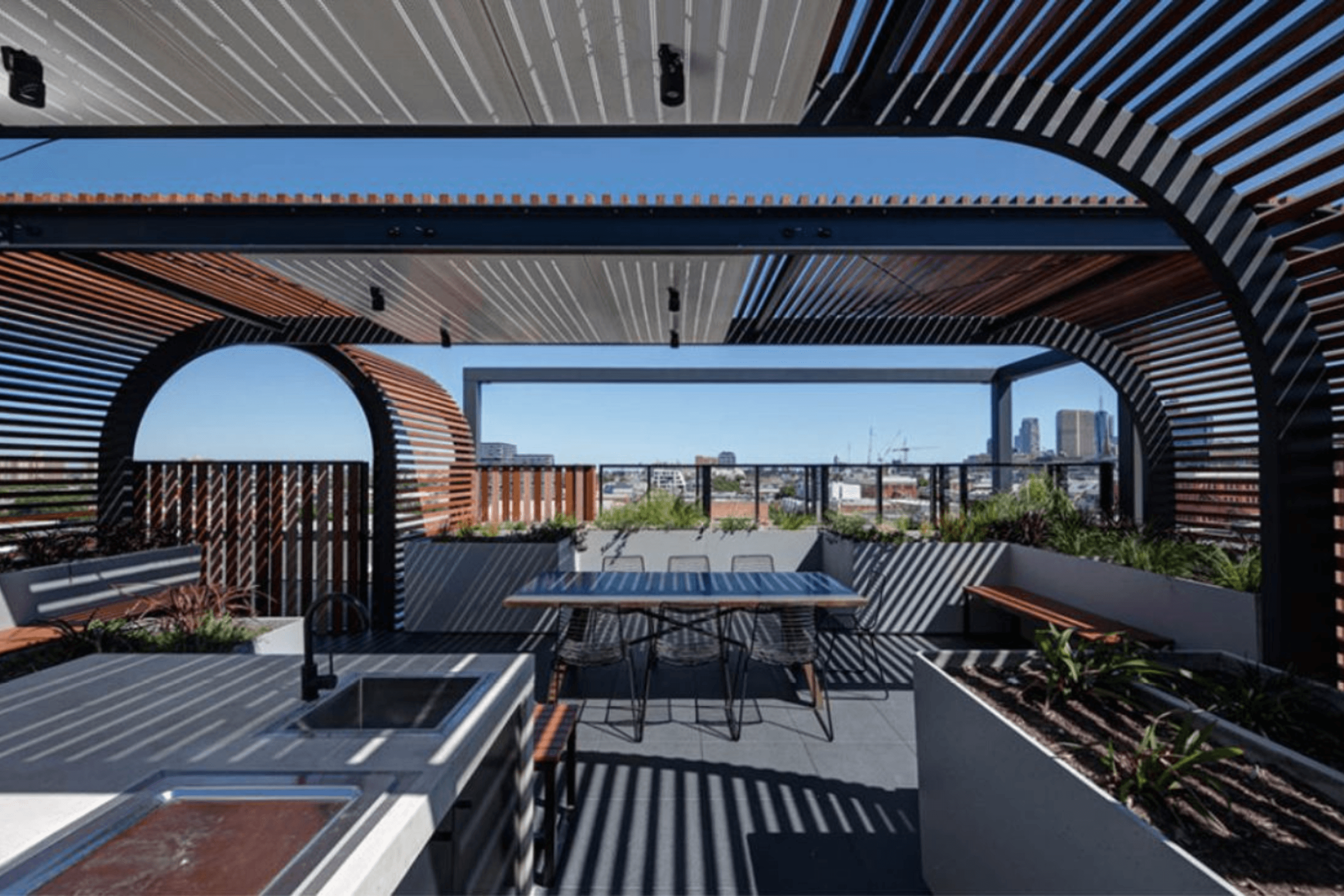 The Rooftop Bar overlooking the Melbourne skyline.