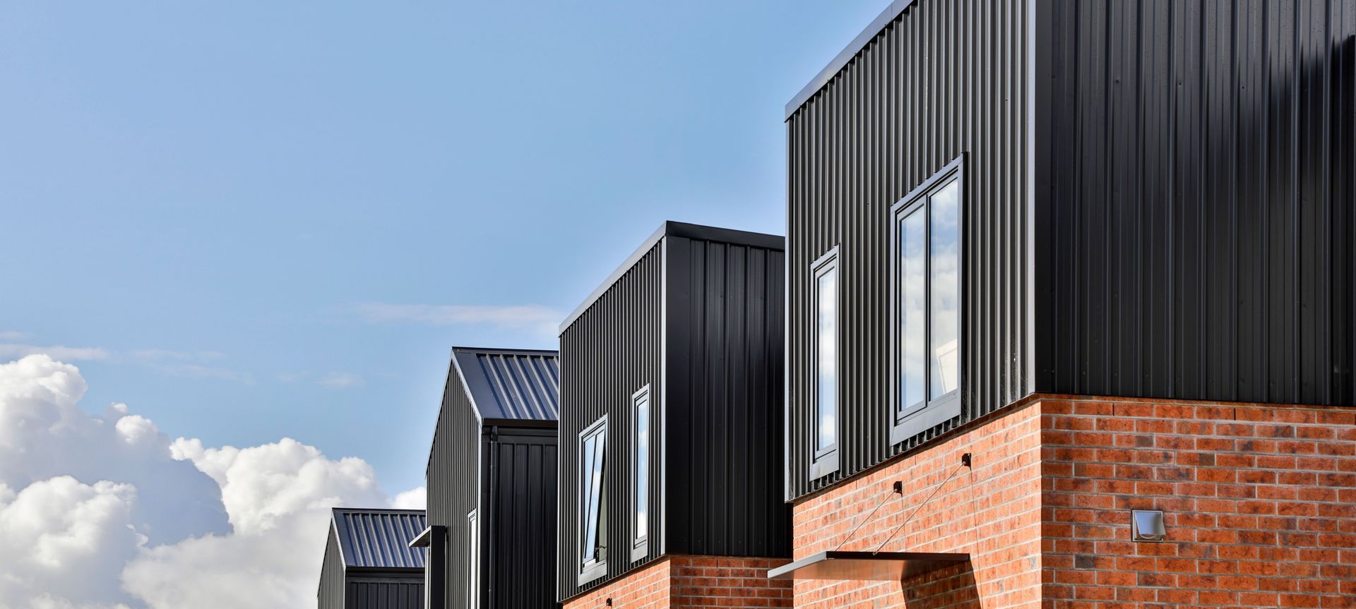 Richmond Townhouses - Trim Rib Roofing & Cladding - Colorsteel banner