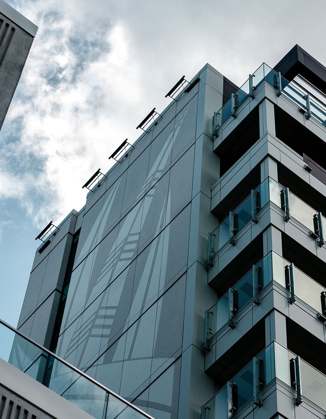 Westlight Apartments, 6 Waikumete Rd, Glen Eden. Product: Equitone Techtiva 00 - engraved.