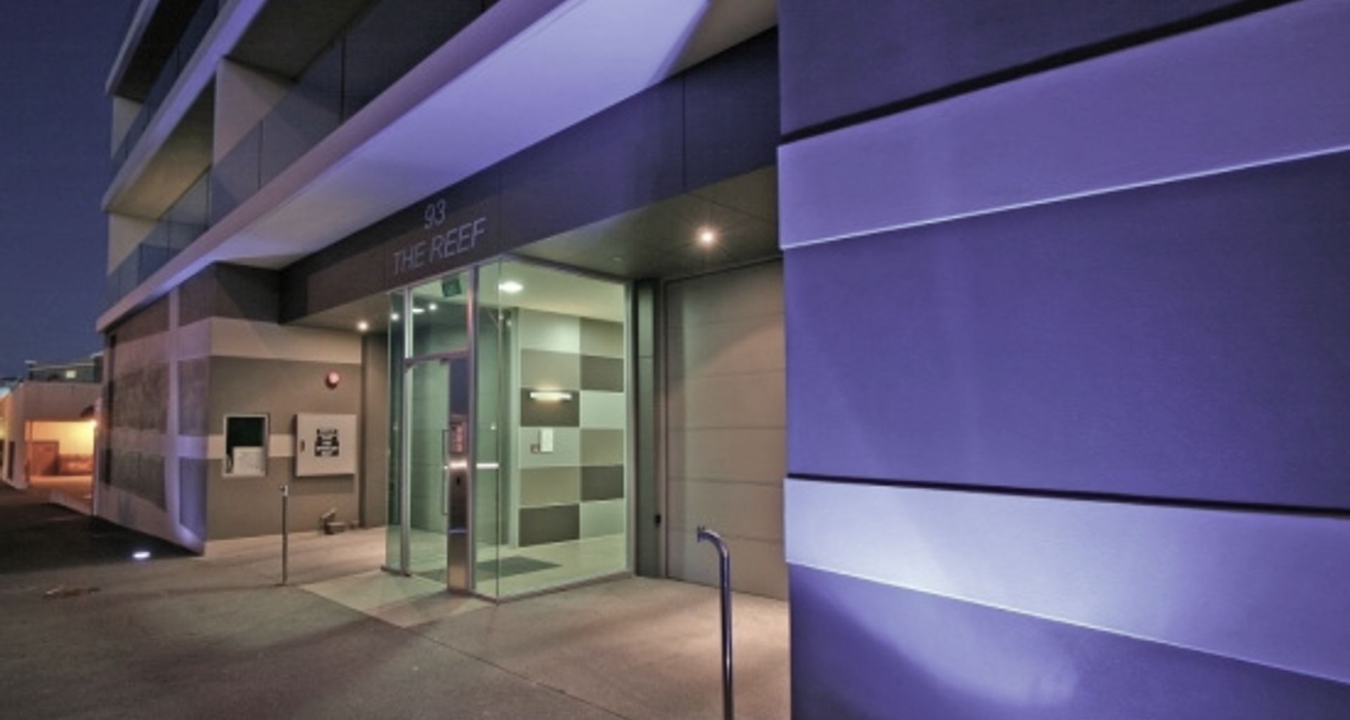 The Reef Apartments banner