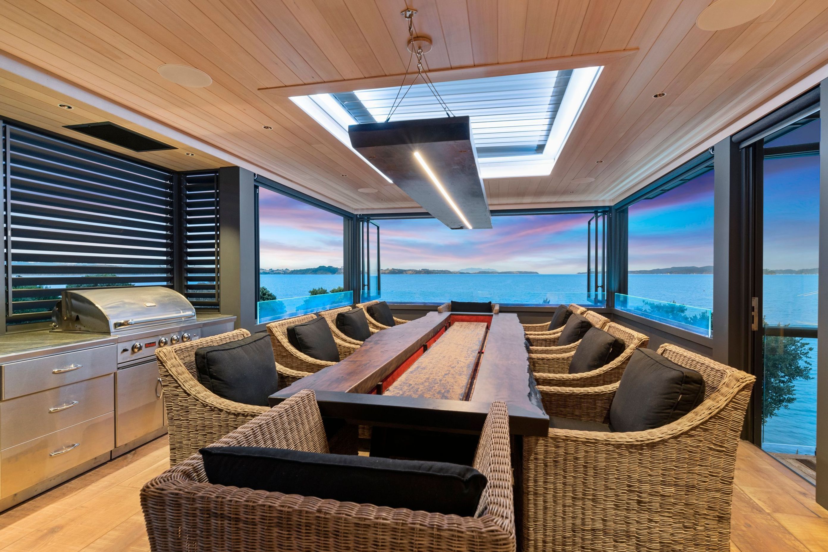 The outdoor room, which formerly was simply a deck, enjoys an internal-external identity and incorporates a full outdoor kitchen to ensure it is the main cooking station of this entertainer’s showpiece.