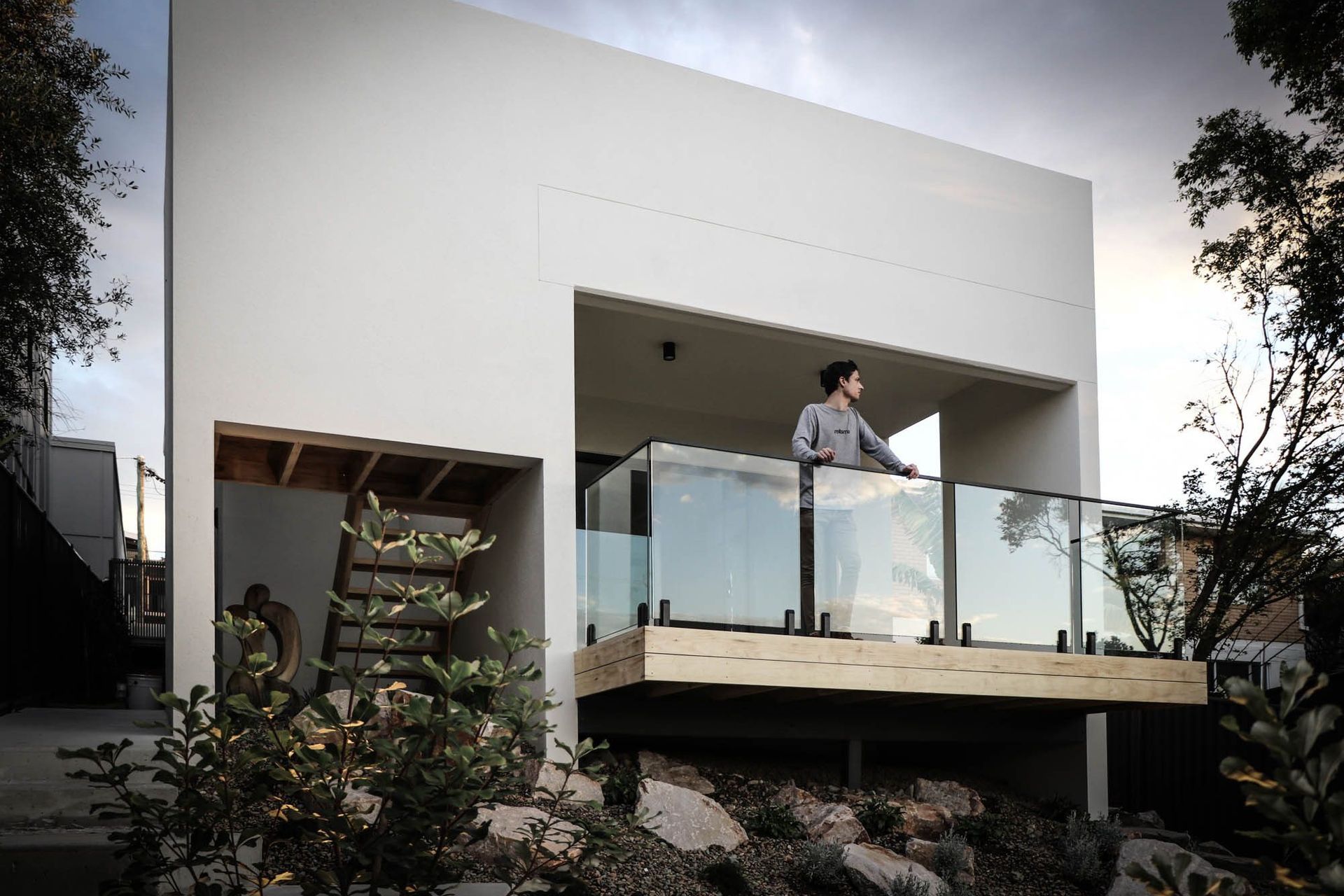 Anderson Residence - Balcony. Glazed balcony on the white upper level.