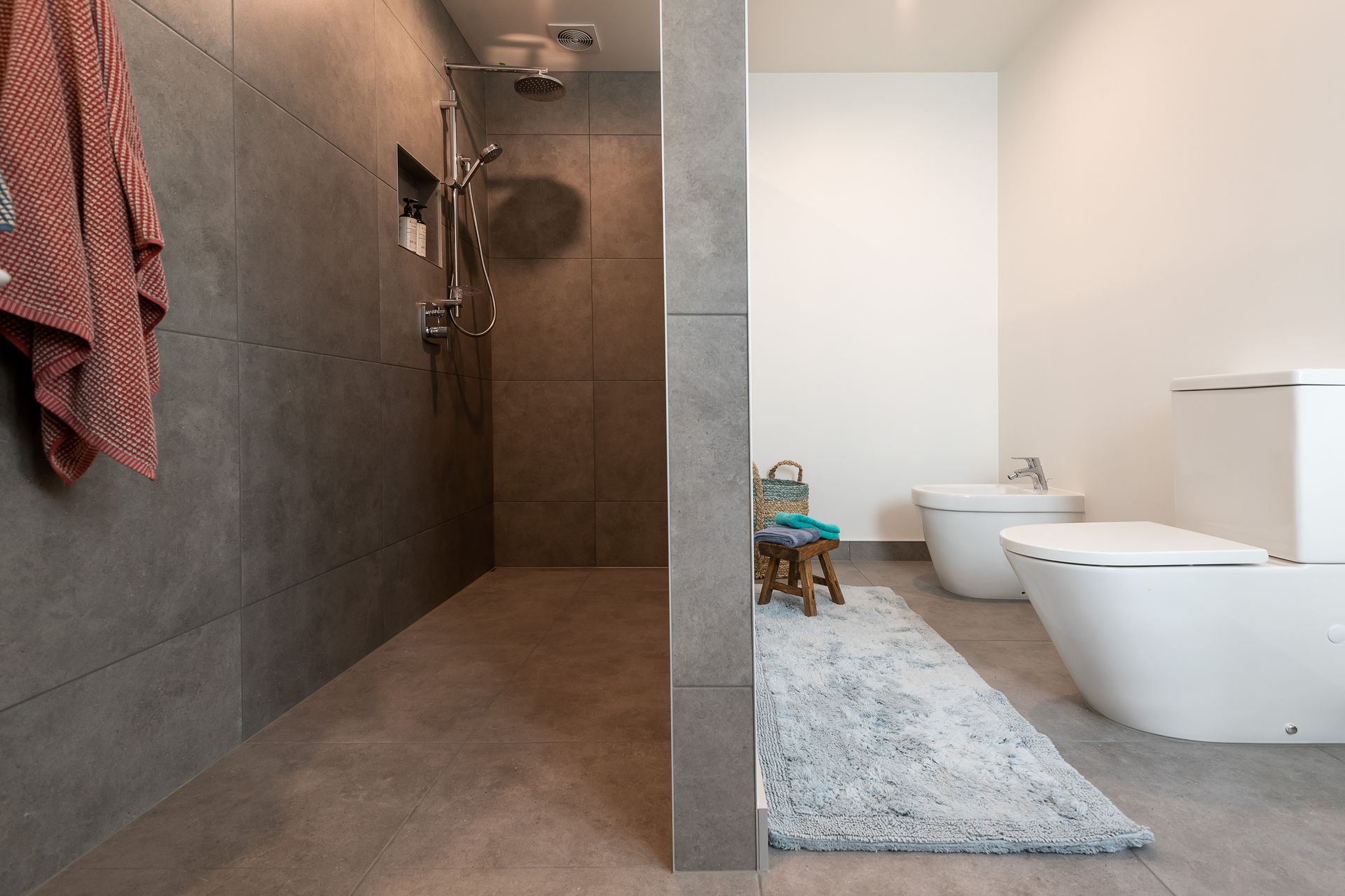 Tracks Ash 600x600mm used in both ensuite and powder room. No longer available but Cordoba series is very similar.