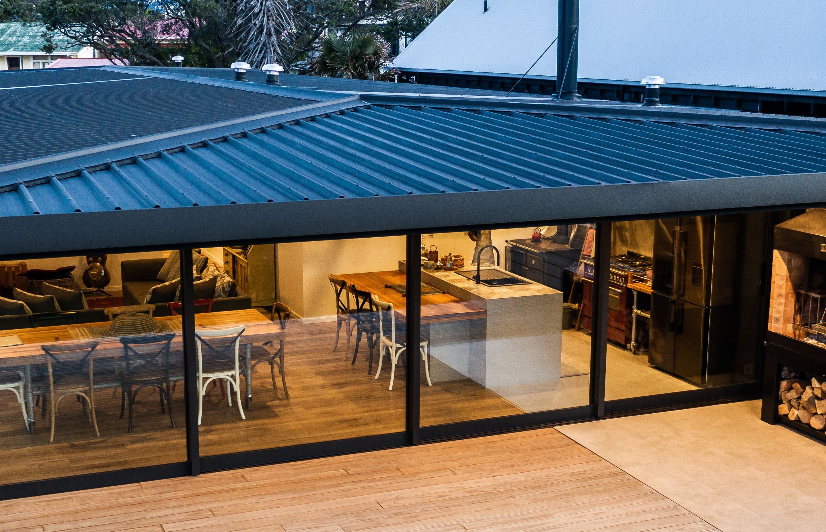 Neptune Max Natural Oak is the predominant floor covering throughout the home. Providing a seamless floor covering from indoors to out. Kitchen and BBQ area flooring features Tracks Ash 600x600mm
