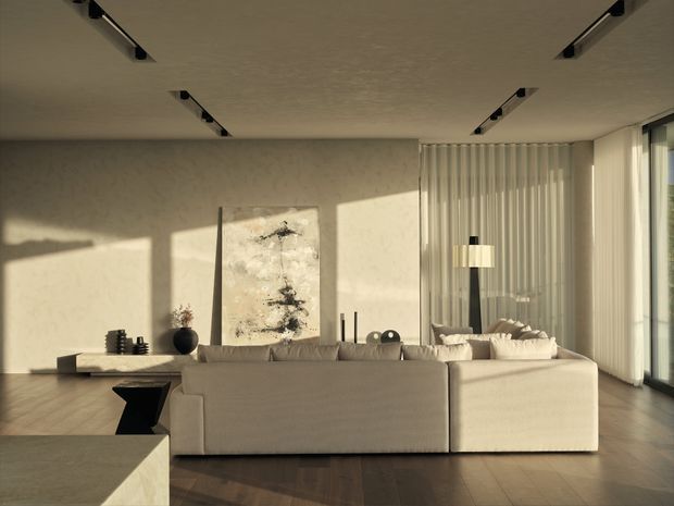 A spacious, refined living room with a large cream sectional sofa facing a low media console and abstract artwork. Warm sunlight casts strong geometric shadows across textured pale walls and dark timber flooring. Floor-to-ceiling glazing with sheer vertical curtains occupies the right side, while slim black recessed track lights run across the ceiling. Minimal sculptural decor and a neutral palette create a calm, contemporary atmosphere.