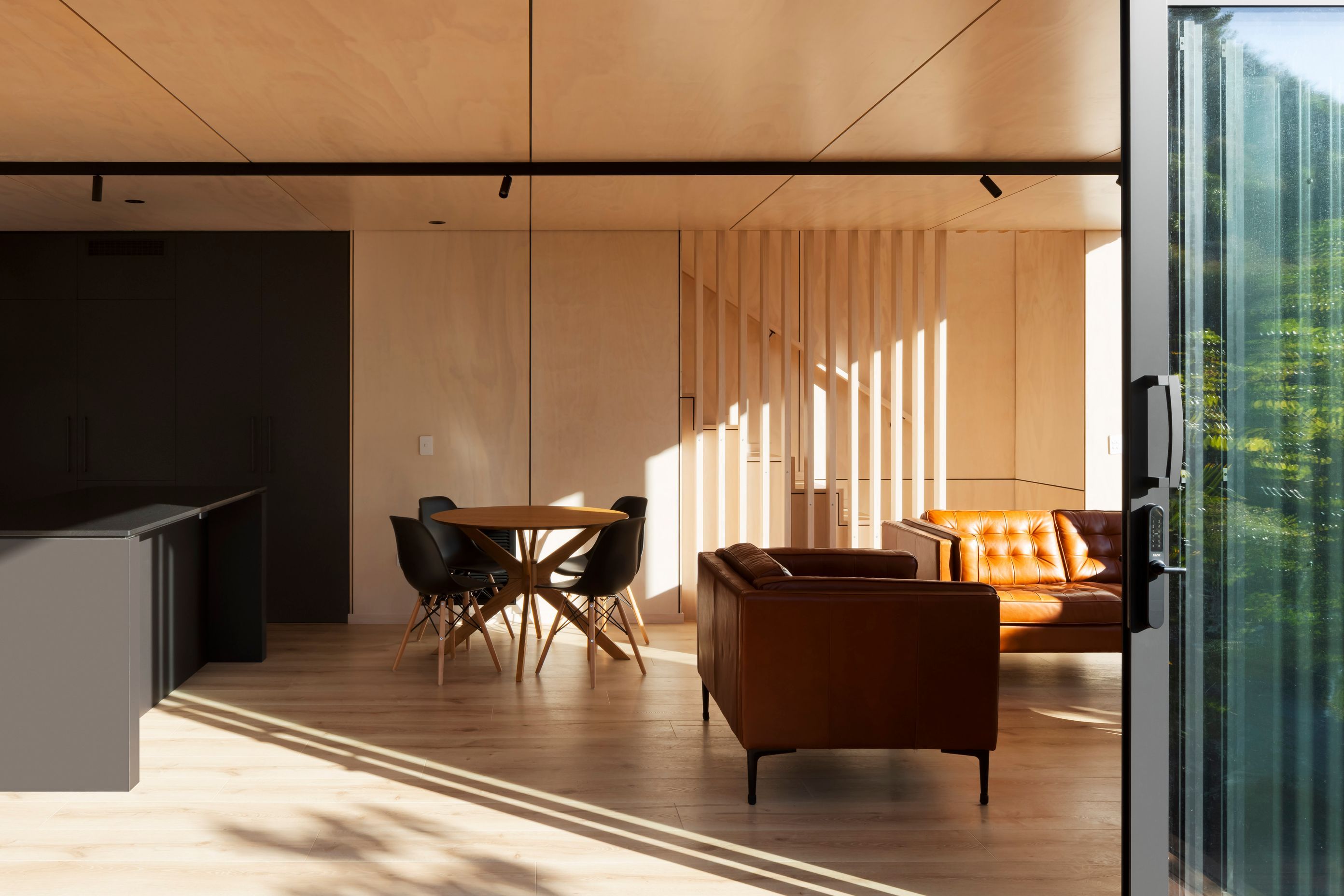 A liberal use of natural materials such as the LVL and timber-framed structure, timber interior finishes and FSC timber decking, along with high thermal performance glazing and ducted heat pump system, has helped the homeowners achieve a highly sustainabl