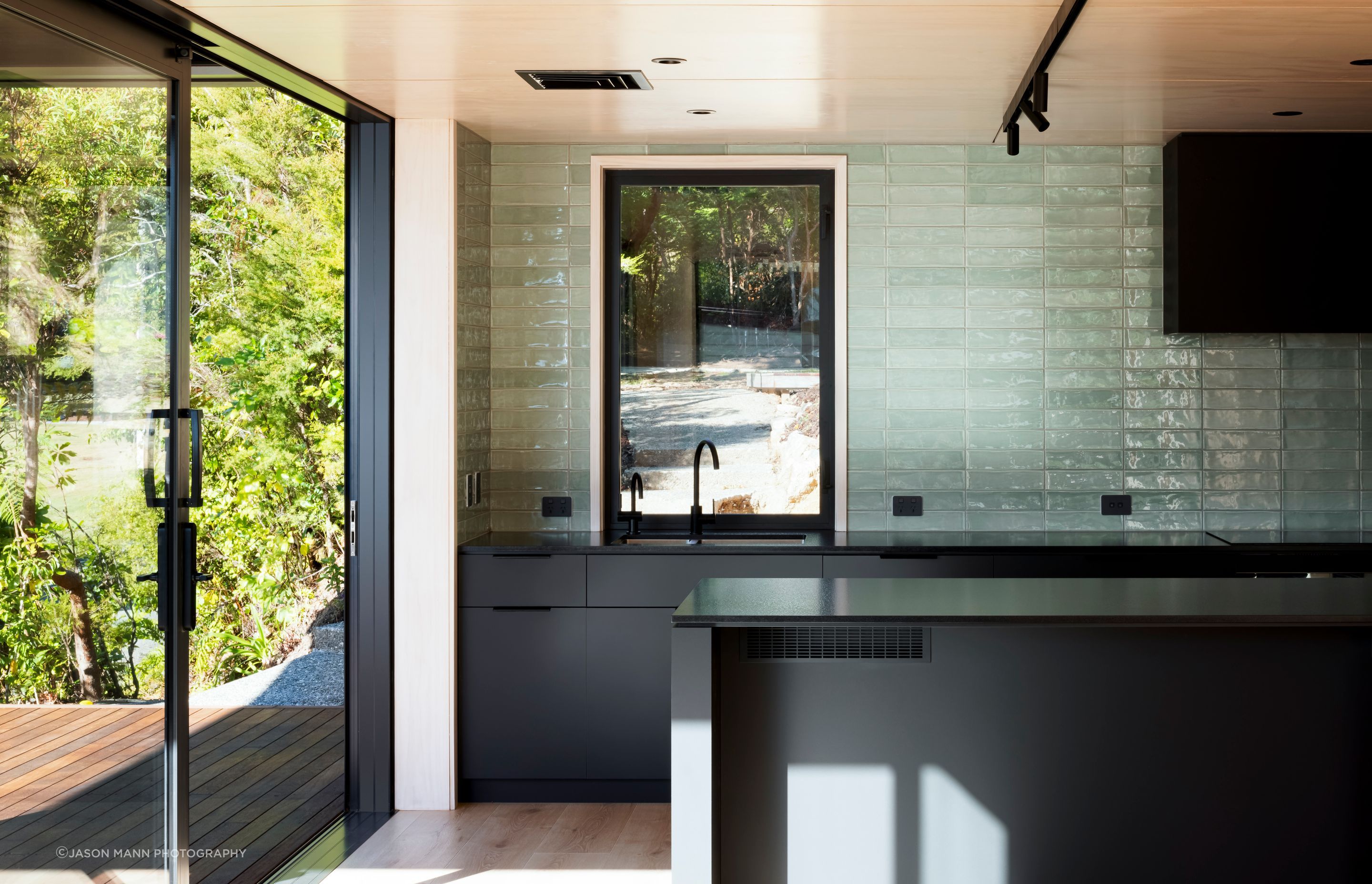 A  favourite photograph of the South Island beech forests served as a jumping off point for the interior colour palette: natural greens with contrasting black.