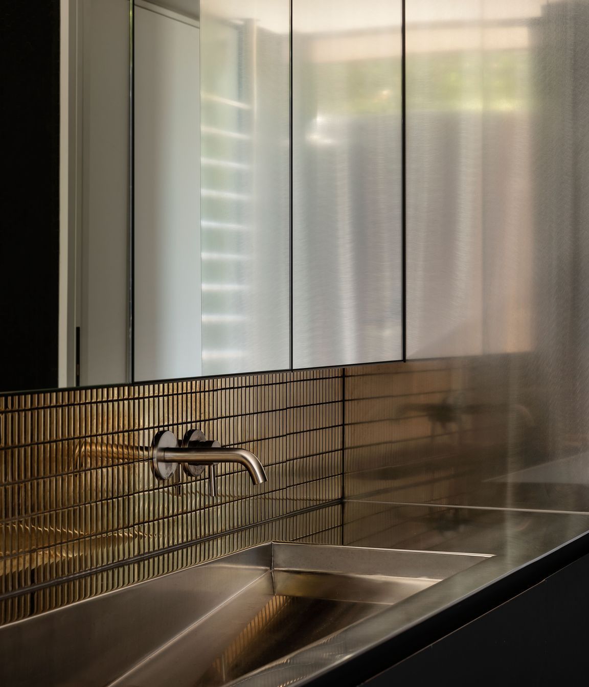 The downstairs guest bathroom provides a "magpie" like element.