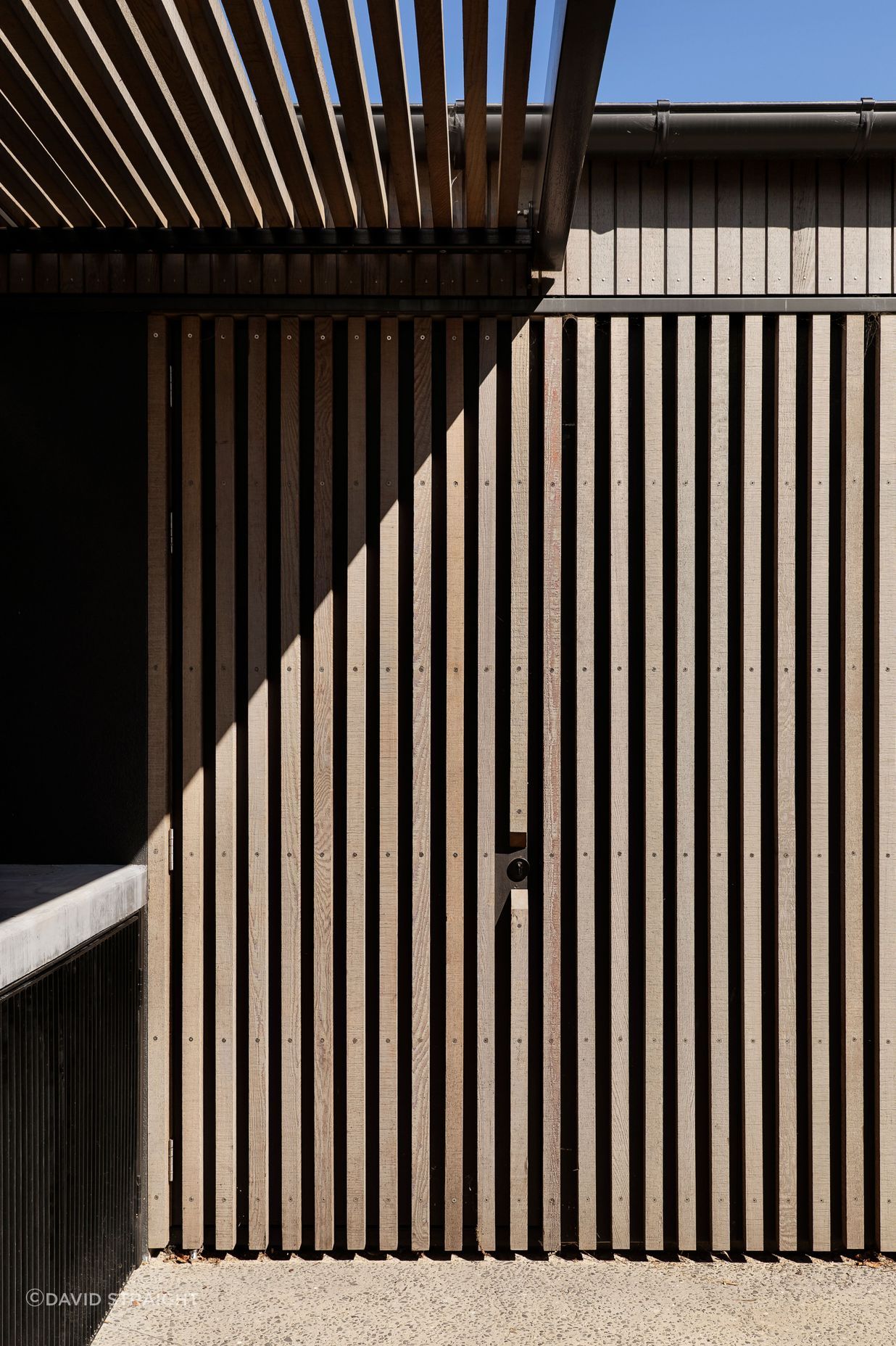 A bespoke concrete filleting bench was designed into the recess adjacent to the garage,