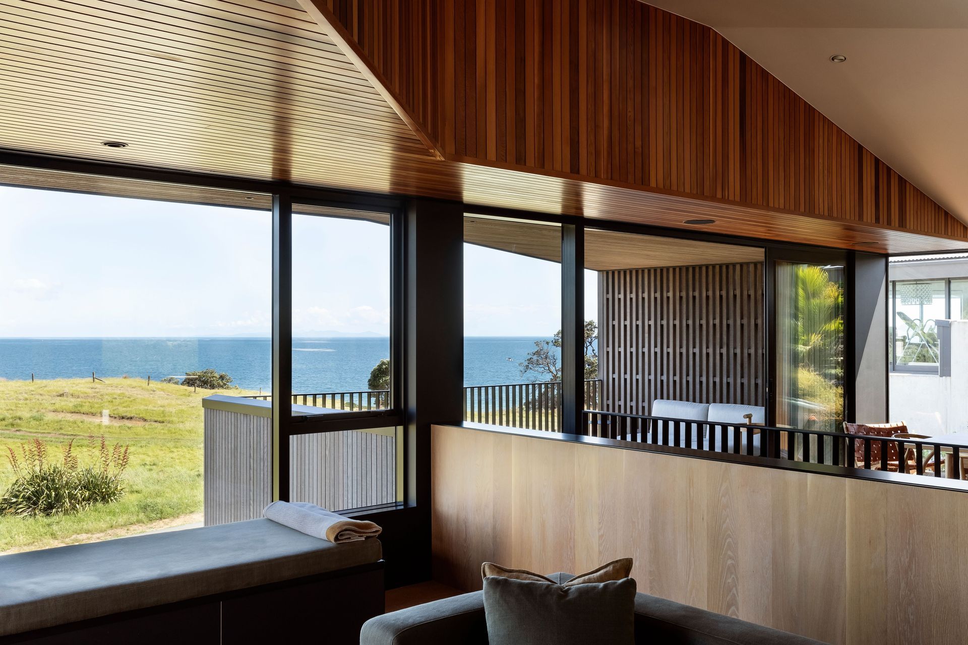 Angular cedar wall linings soften the bach and give it a relaxed feel, in spite of its modern conveniences.