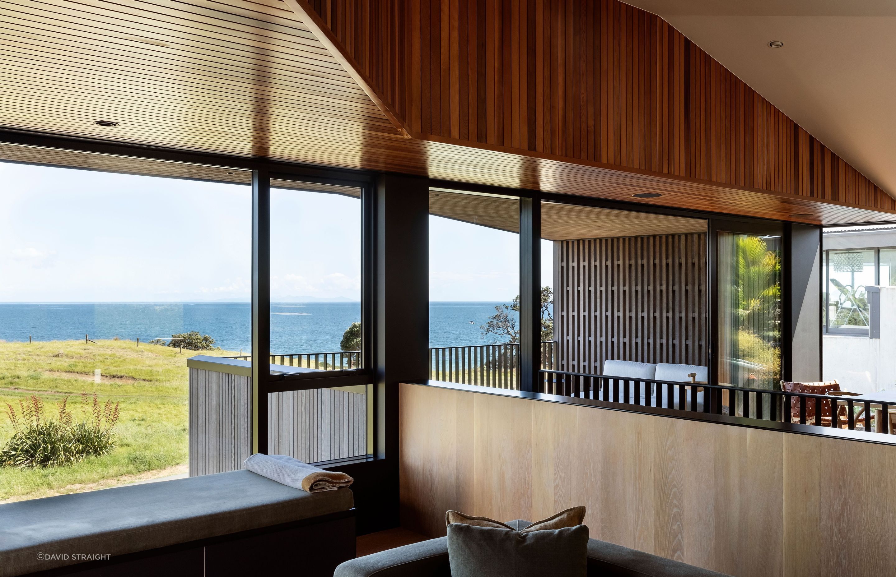 Angular cedar wall linings soften the bach and give it a relaxed feel, in spite of its modern conveniences.