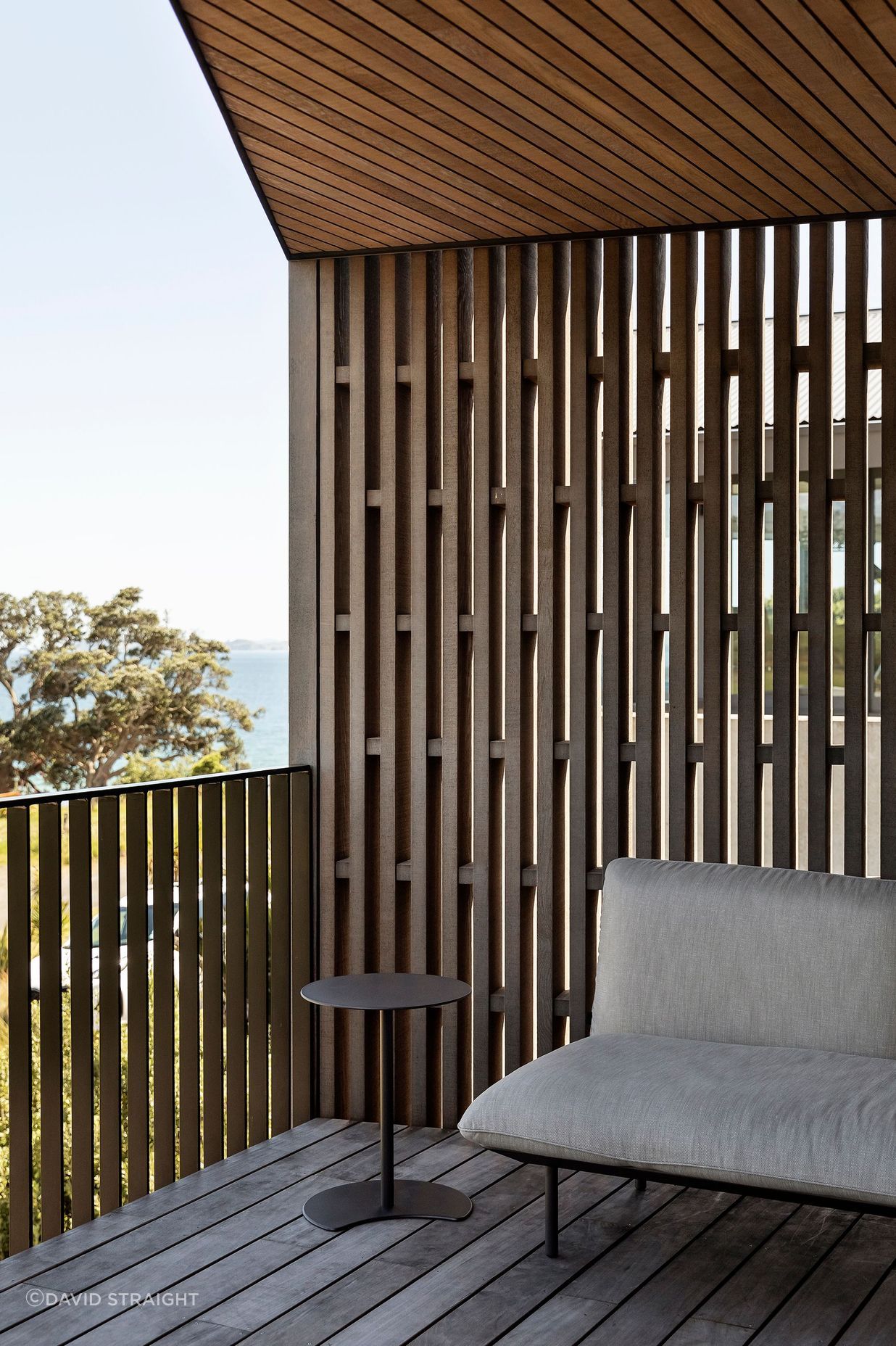 The outdoor deck at the front of the home is an ideal spot for evening drinks.