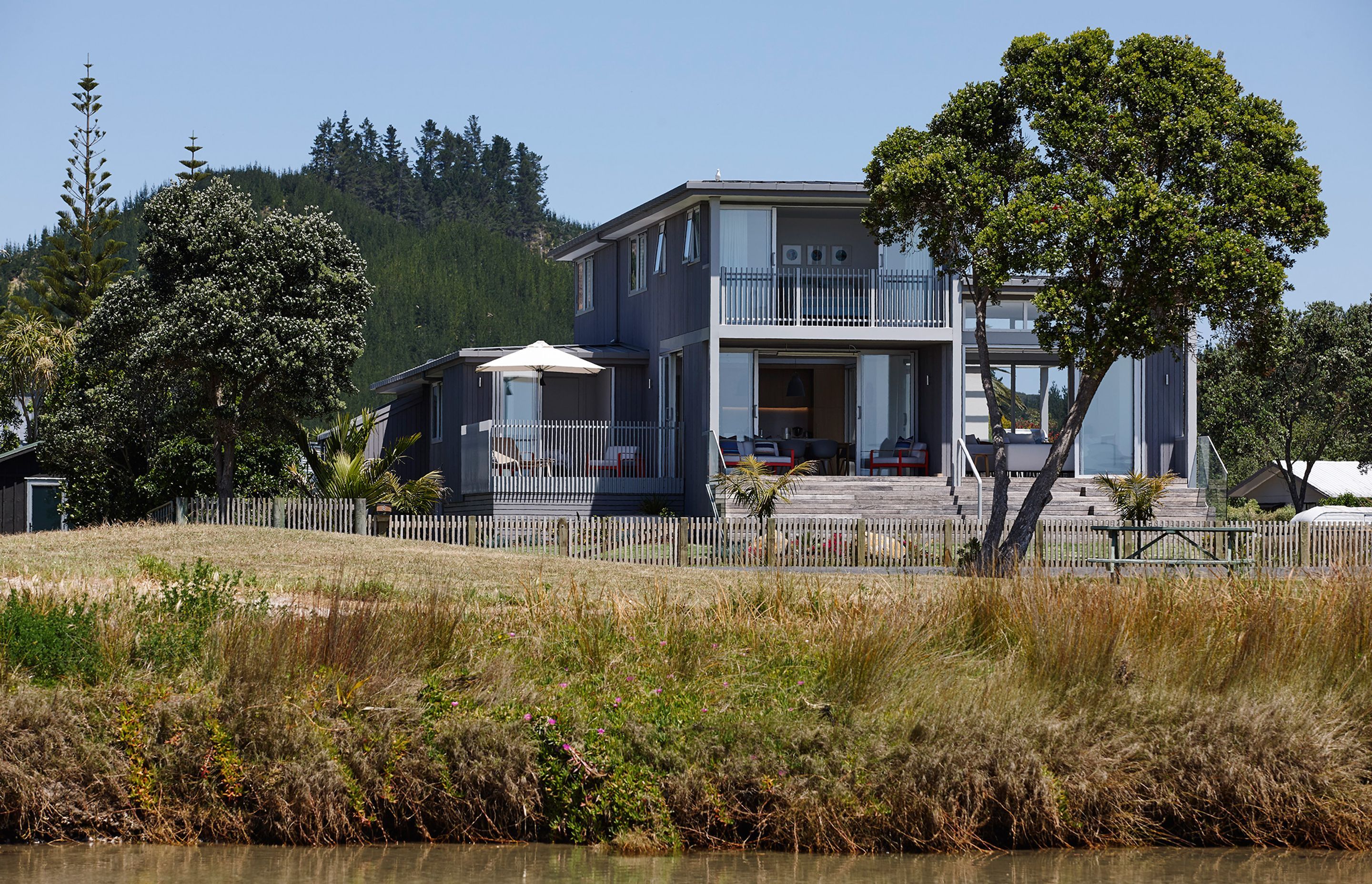 Kate says it’s important a house doesn’t look brand new and out of place. “We don't want a house to look like it's just arrived. In this case, it's kind of dipped in the sand, it's dipped in those grasses on the beach.”