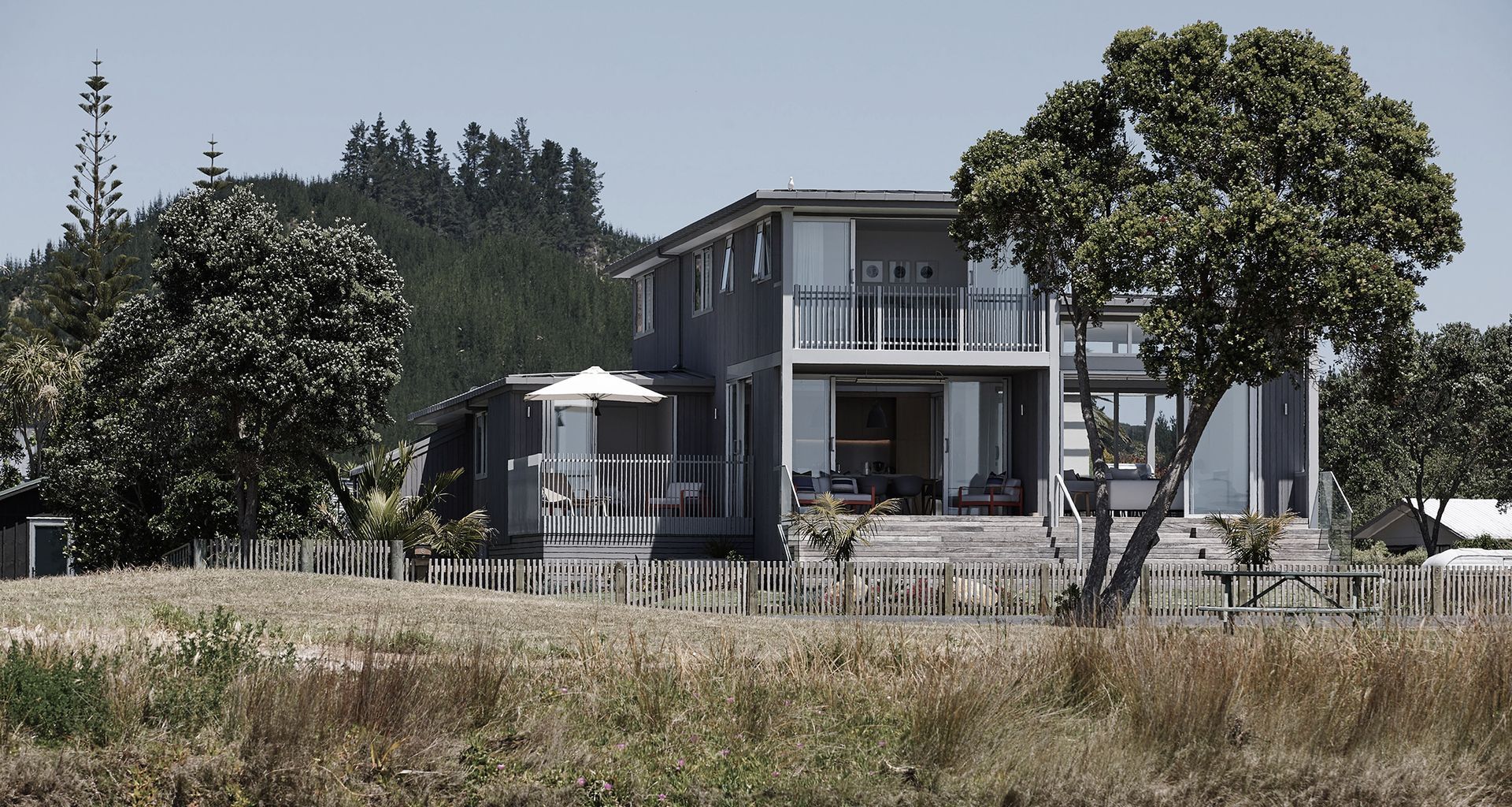 The beachfront Coromandel bach with every detail considered banner