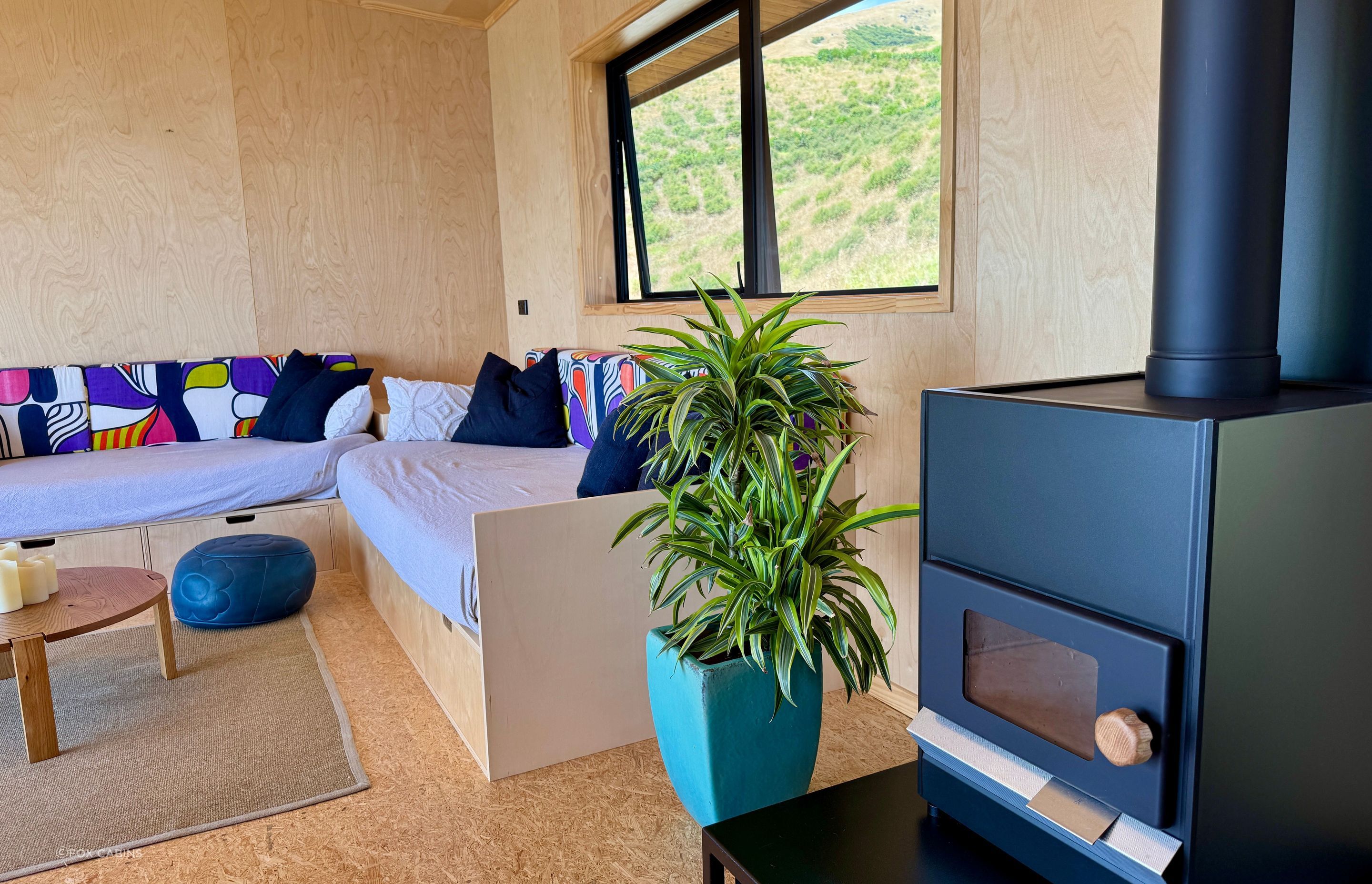 Fireplace-and-Livingroom-of-The-Bach-Modular-Home-by-Fox-Cabins-Feb-2025.jpg