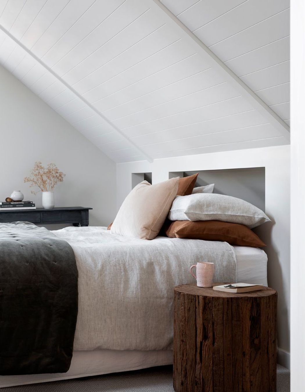 Muted colours and natural materials help lend the home the 'Cape Cod' feel the owners wanted.