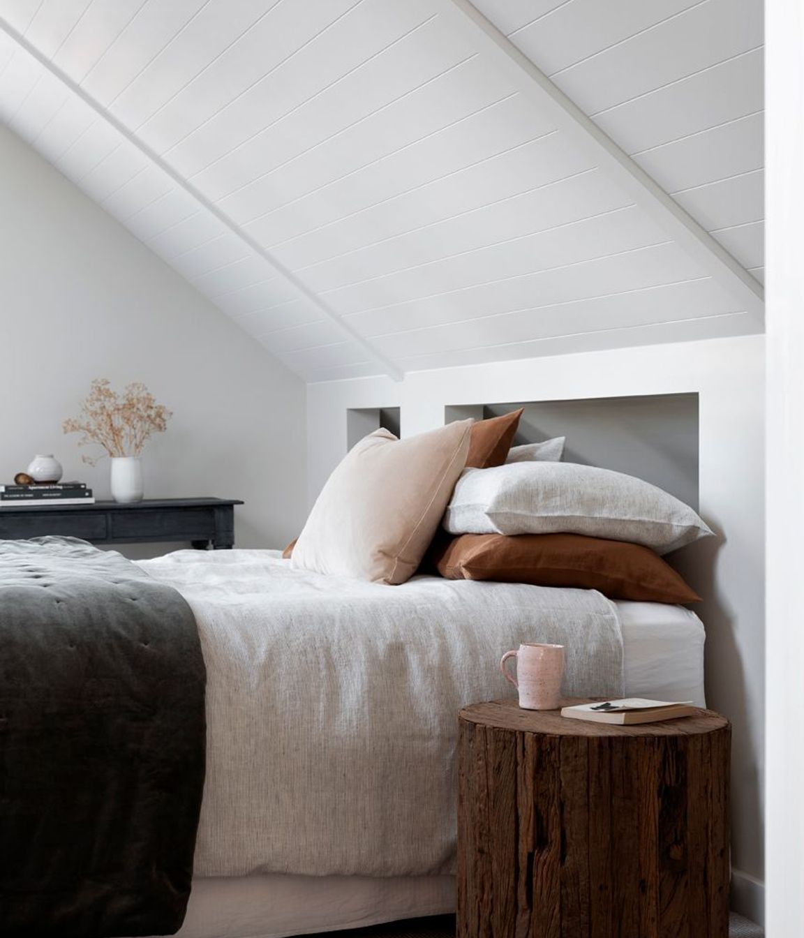 Muted colours and natural materials help lend the home the 'Cape Cod' feel the owners wanted.
