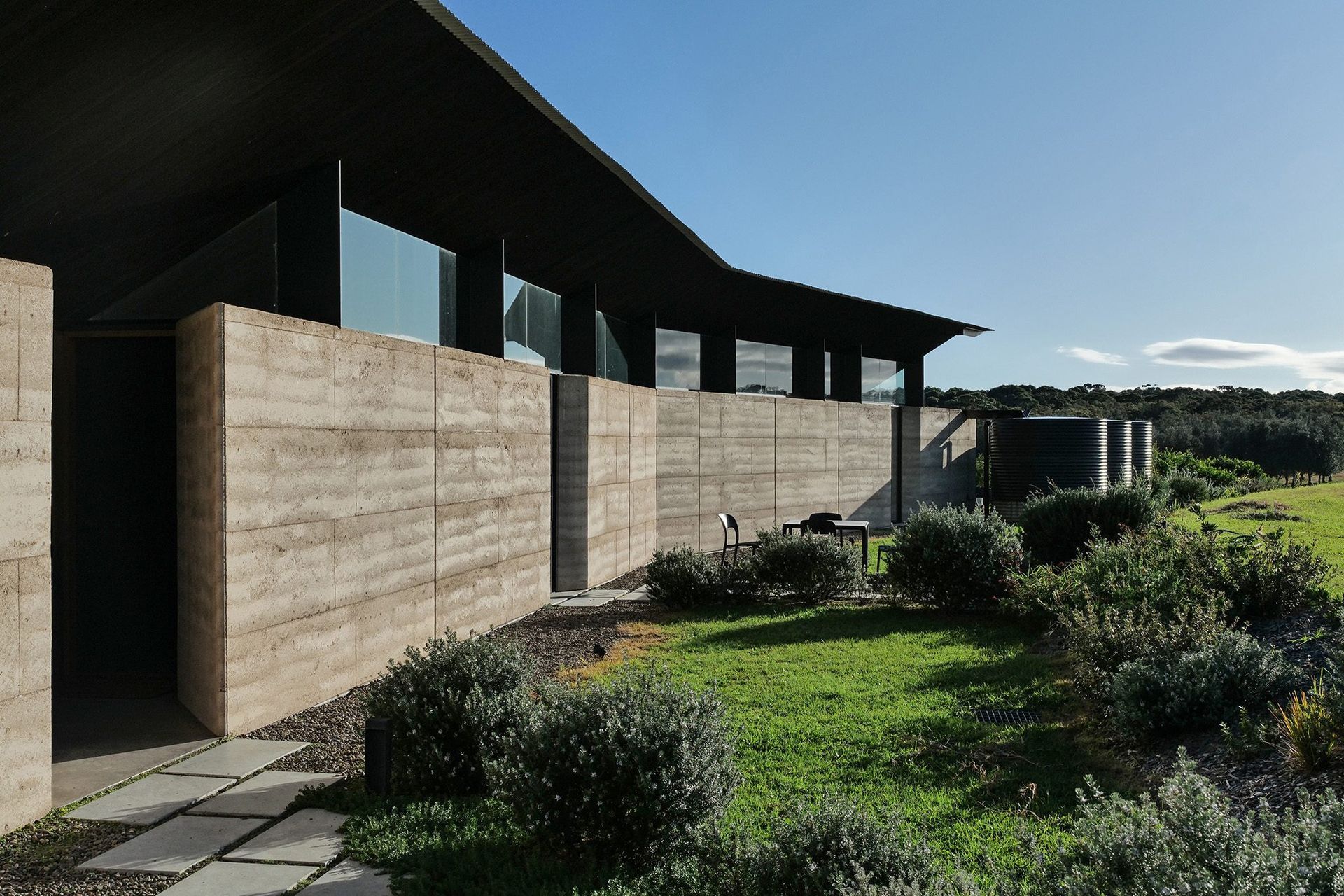 Mystery Bay House exterior; linear landscape