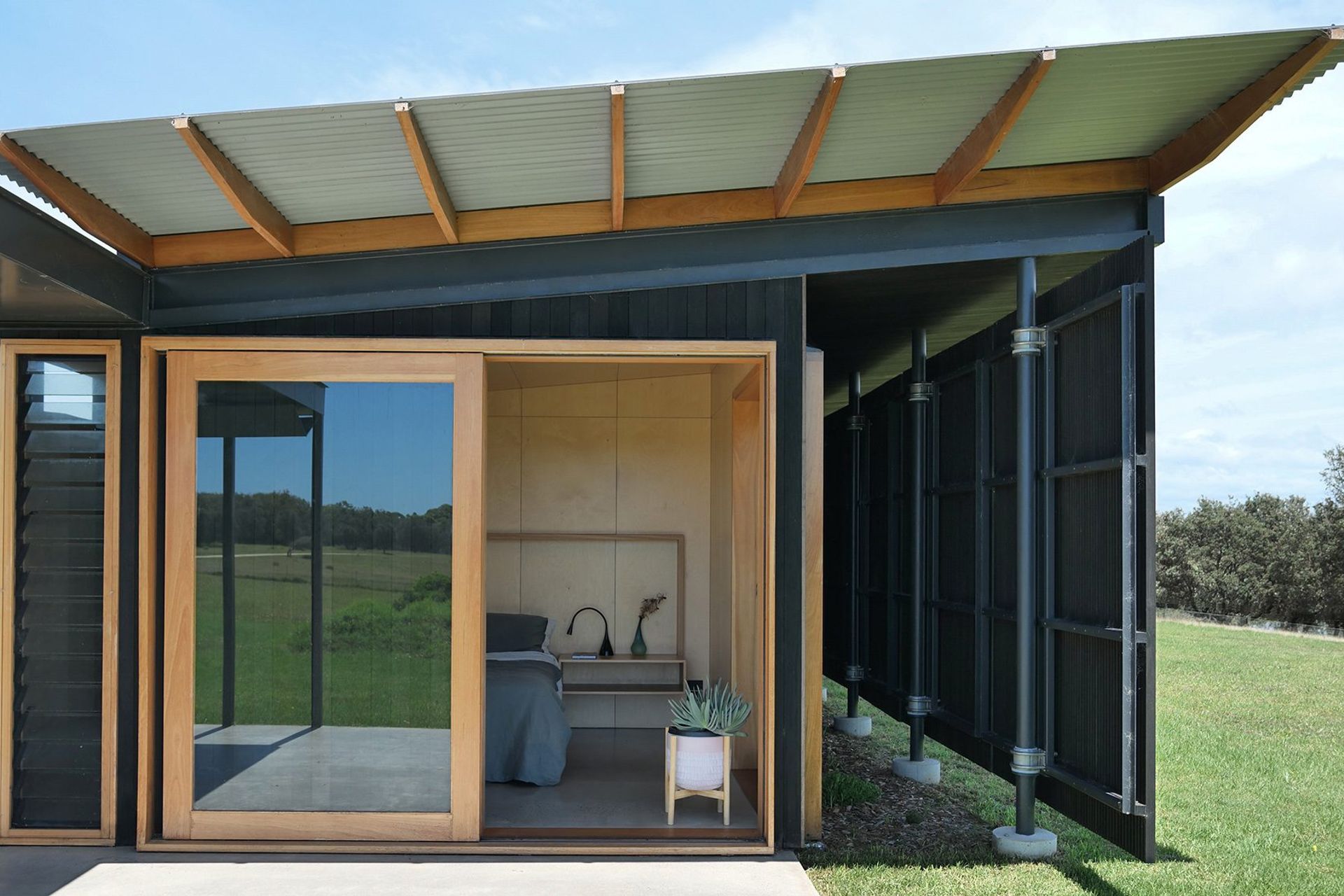 Find tranquility and coastal charm in the bedroom of Mystery Bay House. Unwind, recharge, and embrace the beauty of nature in this serene coastal sanctuary