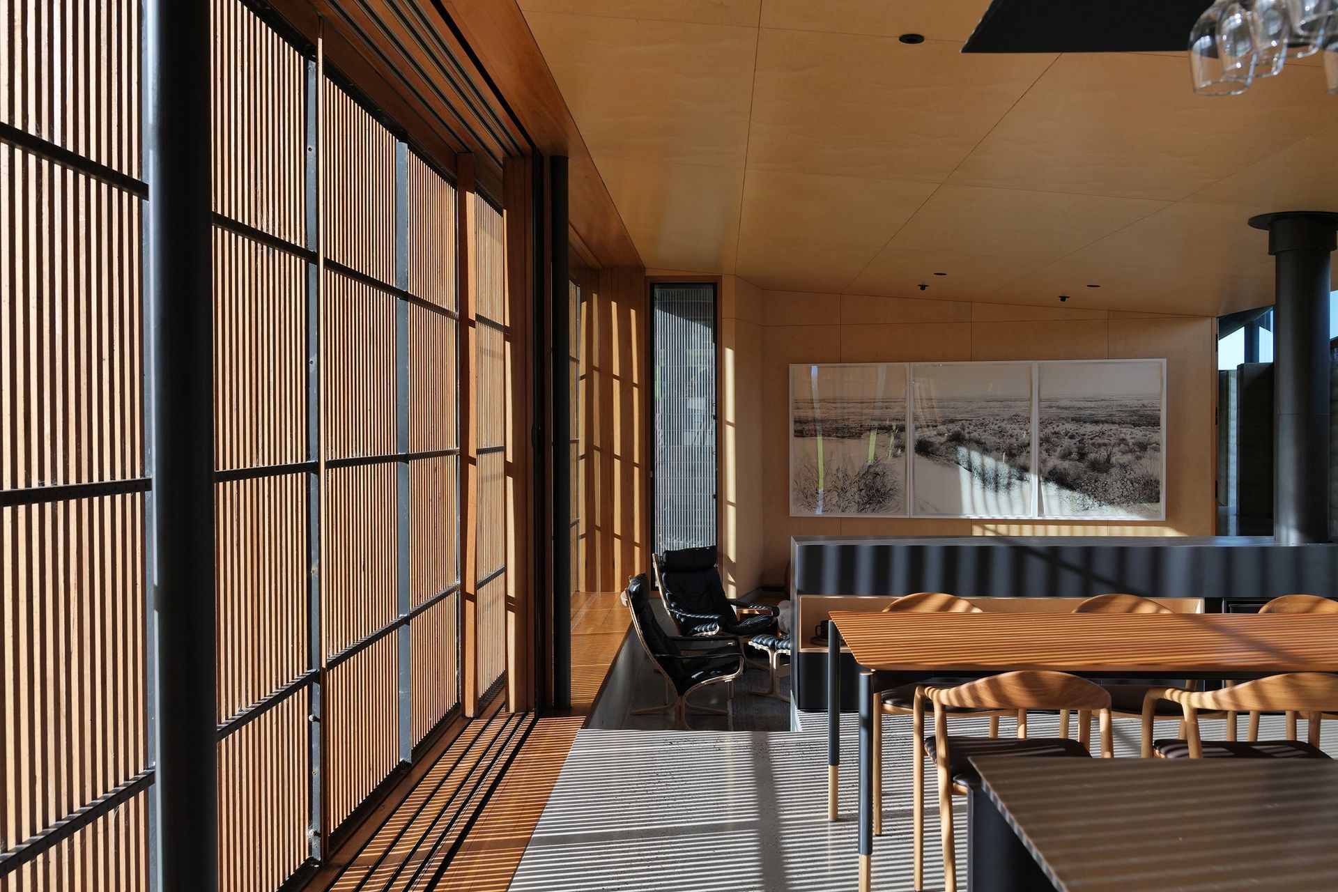 Shadow play through timber panelling in this coastal abode