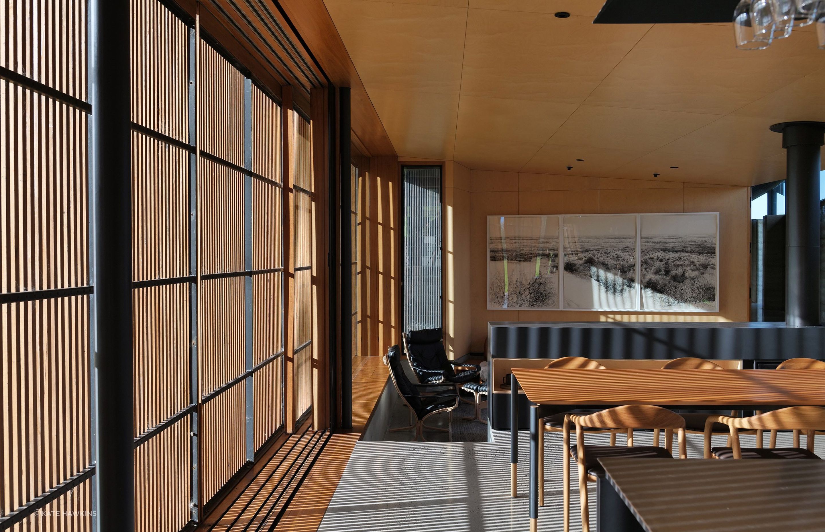Shadow play through timber panelling in this coastal abode