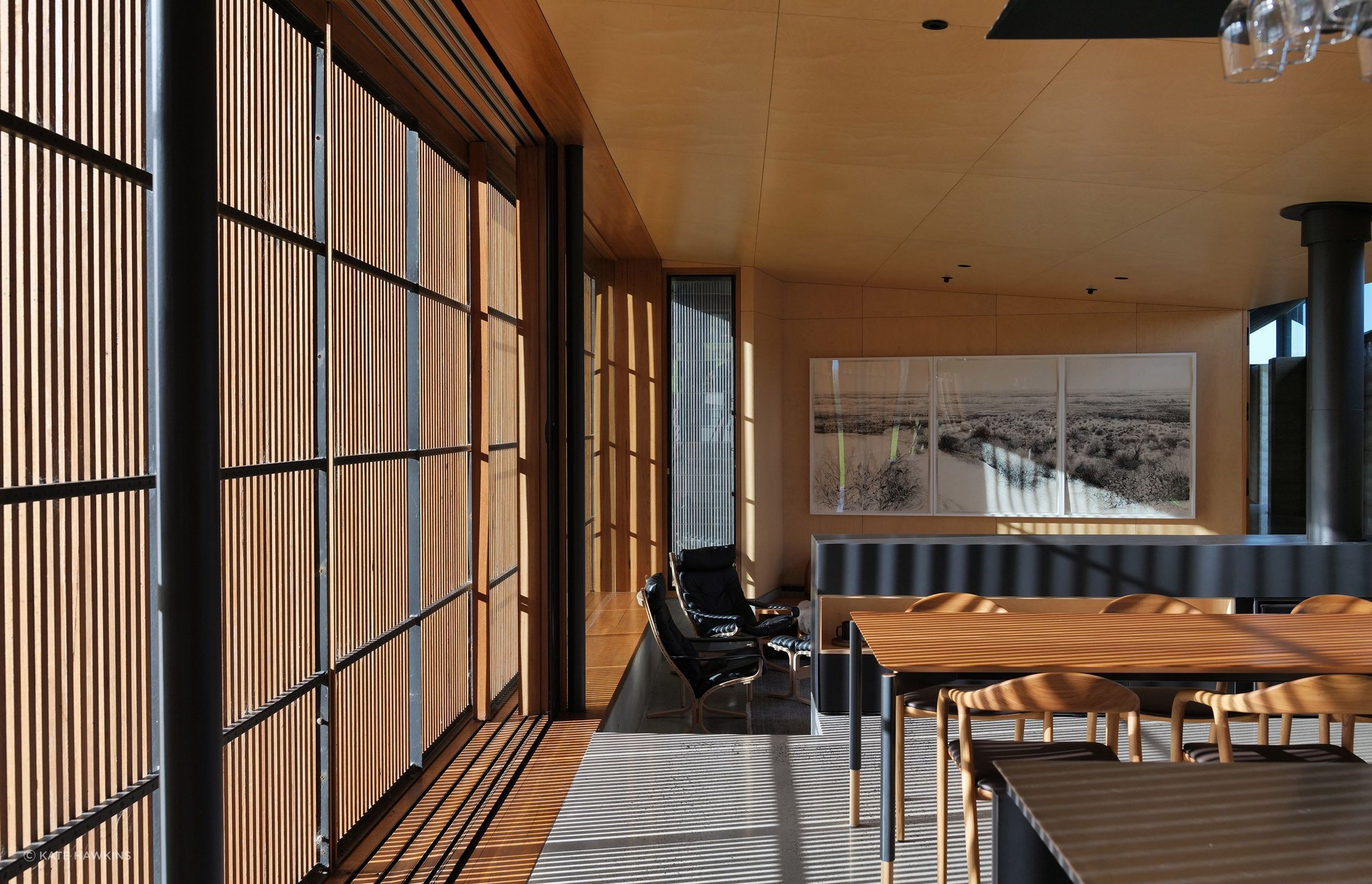Shadow play through timber panelling in this coastal abode