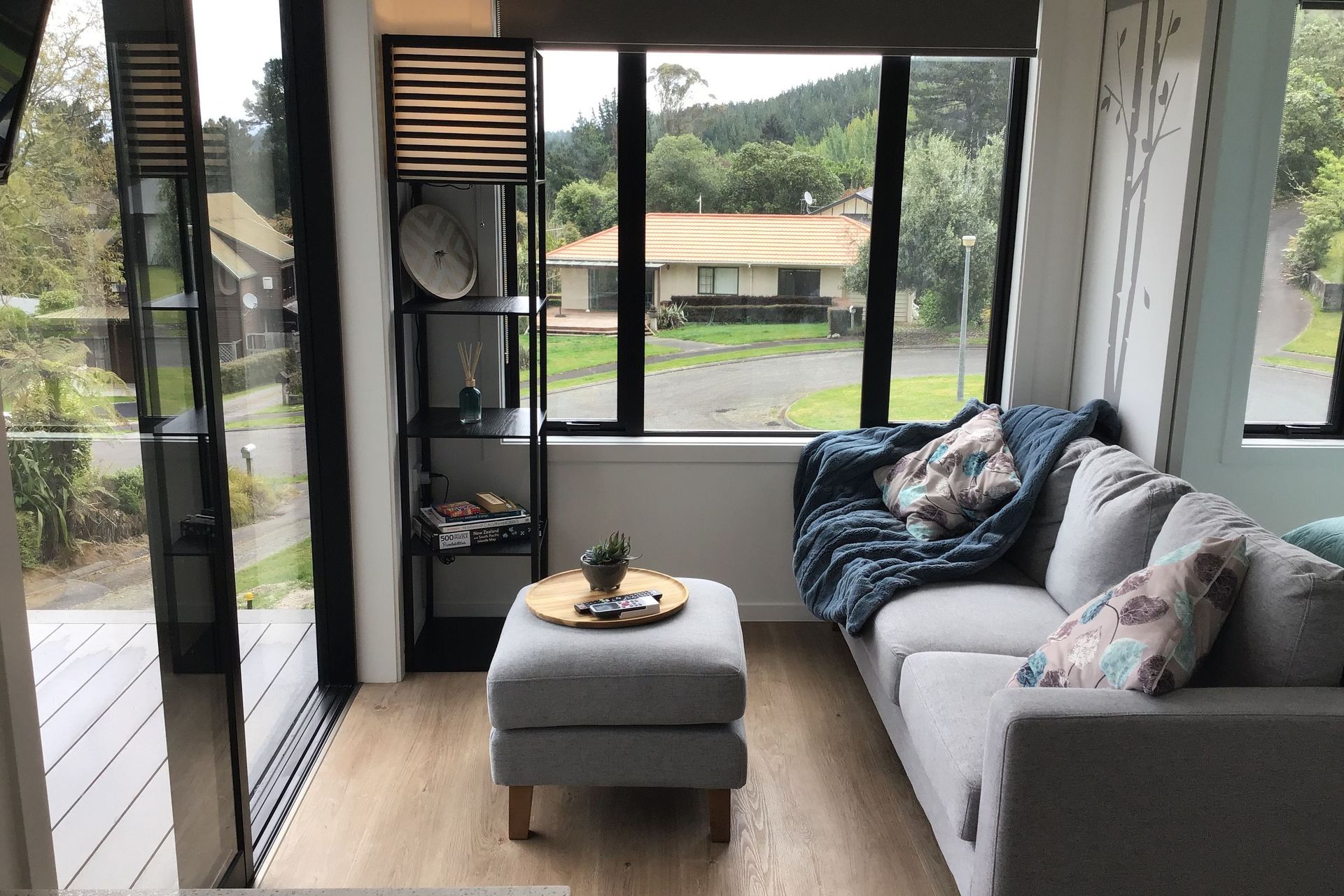 Living room opens onto deck with level threshold for accessibility